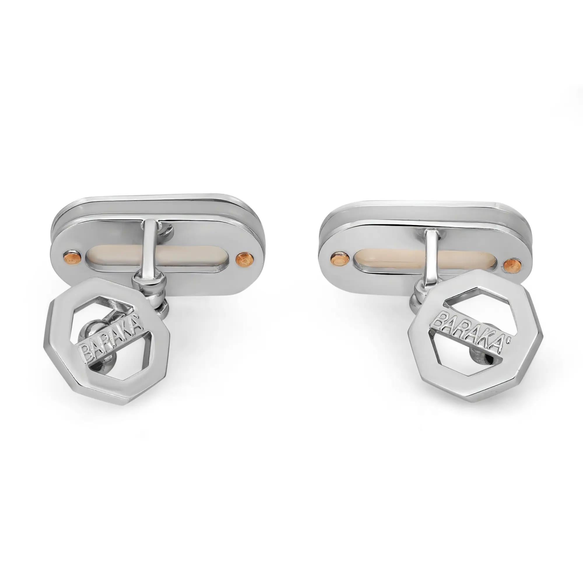 These stunning Baraka cufflinks feature white Mother of Pearl encased in 18K white gold with rose gold accents. Size: 18mm x 9mm. Total weight: 10.62 grams. Display Model. Unworn condition. Made in Italy. Comes with a Baraka tag and a presentable
