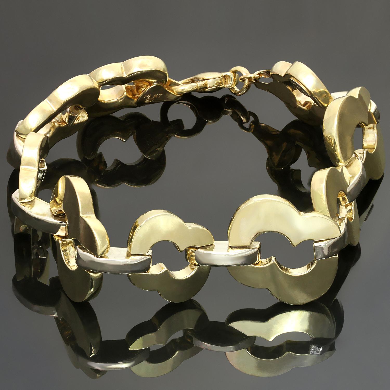 Ce bracelet chic Baraka présente des maillons géométriques façonnés en or blanc et jaune 14k. Fabriqué en Italie dans les années 1990. Dimensions : 0,82