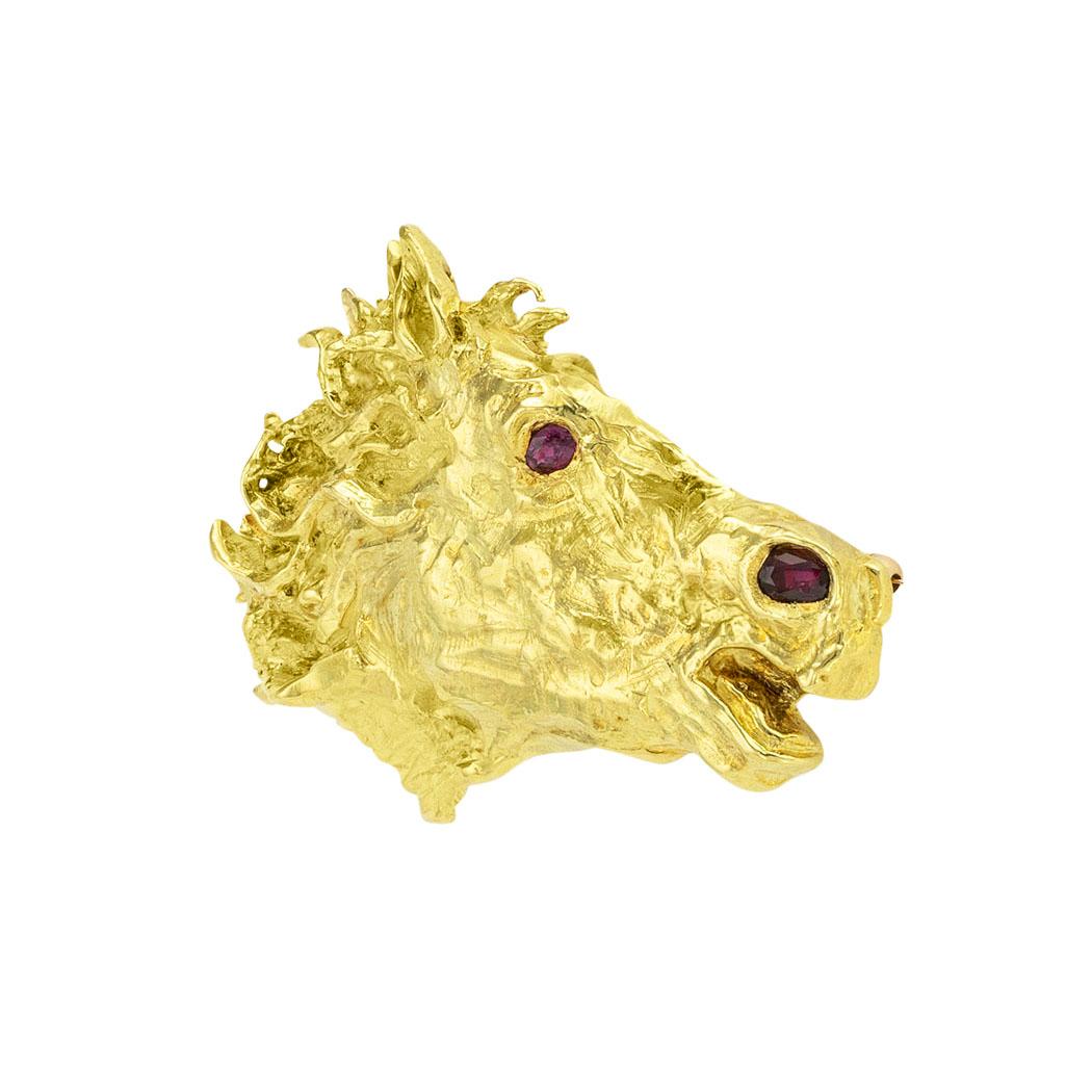 Barbara Anton ruby and yellow gold horse head slide-brooch circa 1970. *

ABOUT THIS ITEM:  #P5024. Scroll down for specifications.  Barbara Anton’s interpretation of a horse at full gallop is palpably visible in this intense horse’s head slide