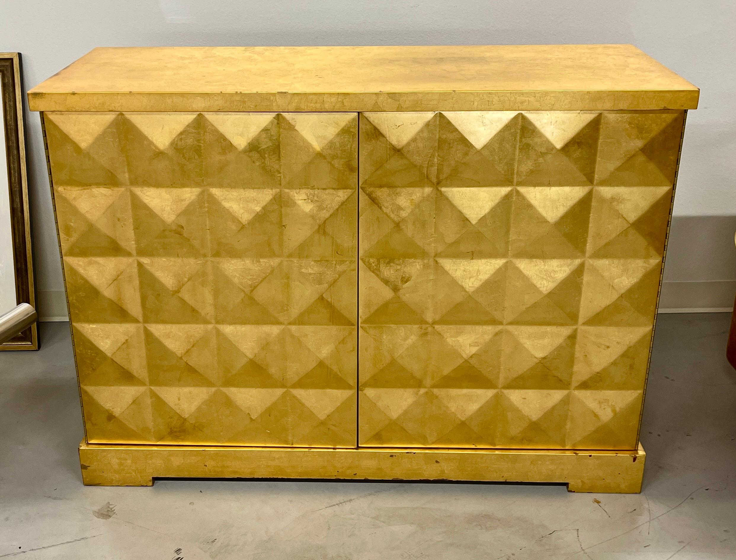 Beautiful Barbara Barry for Baker Furniture gold leaf chest with a diamond pattern in front. The piece bears the tag on the rear. It is style number 3428. Pretty piece with some loss to the gold leaf and some nicks and imperfections. The front door
