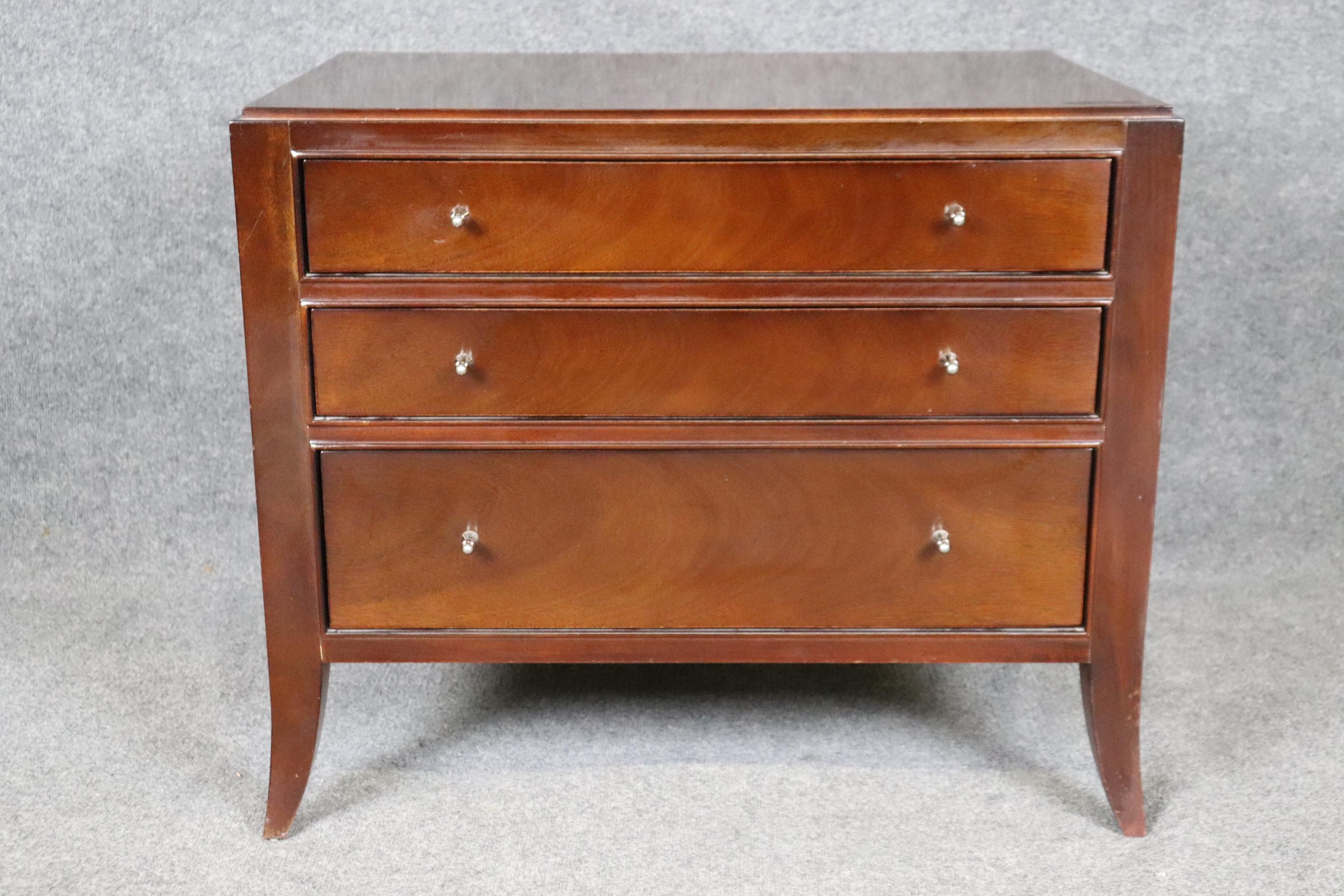 This is a spectacular commode or dresser by the famous designer Barbara Barry who drew inspiration from the French Art Deco era and designers like Ruhlman and Leleu of Paris. This beautiful mahogany commode features gorgeous mahogany wood finishing
