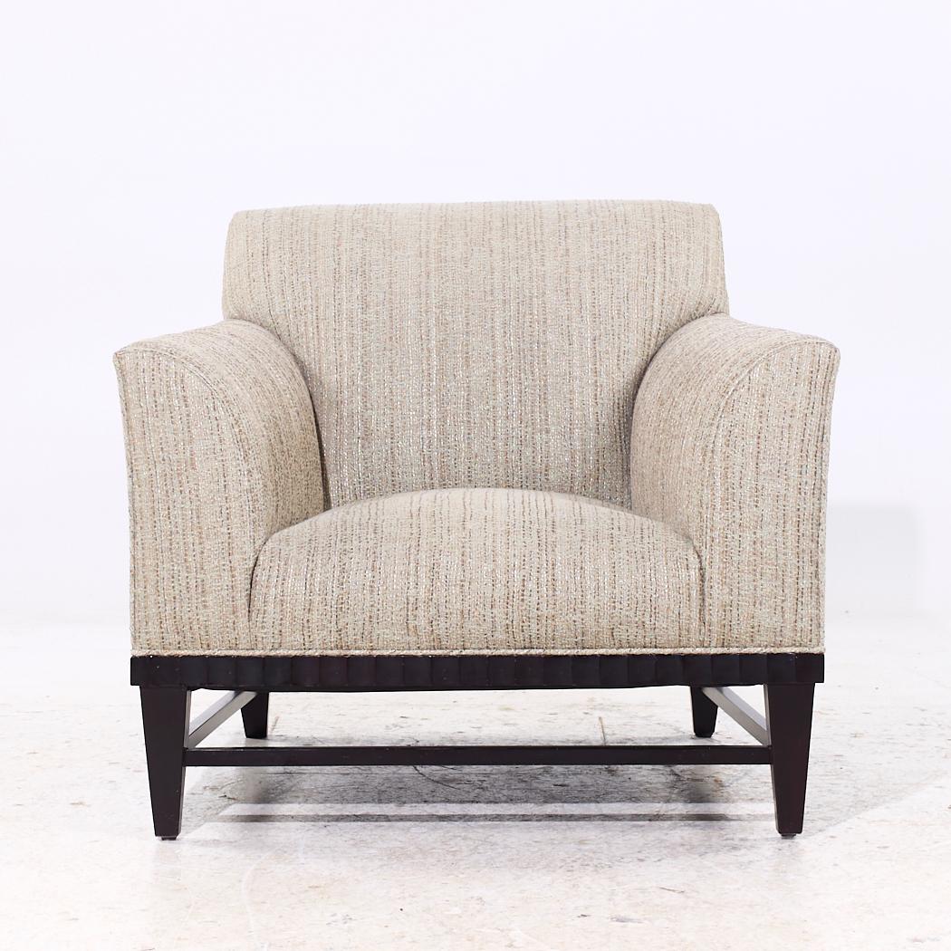 Barbara Barry Fluted Lounge Chair

This chair measures: 35.75 wide x 39 deep x 31.25 high, with a seat height of 16.5 and arm height/chair clearance of 21.5 inches

We take our photos in a controlled lighting studio to show as much detail as