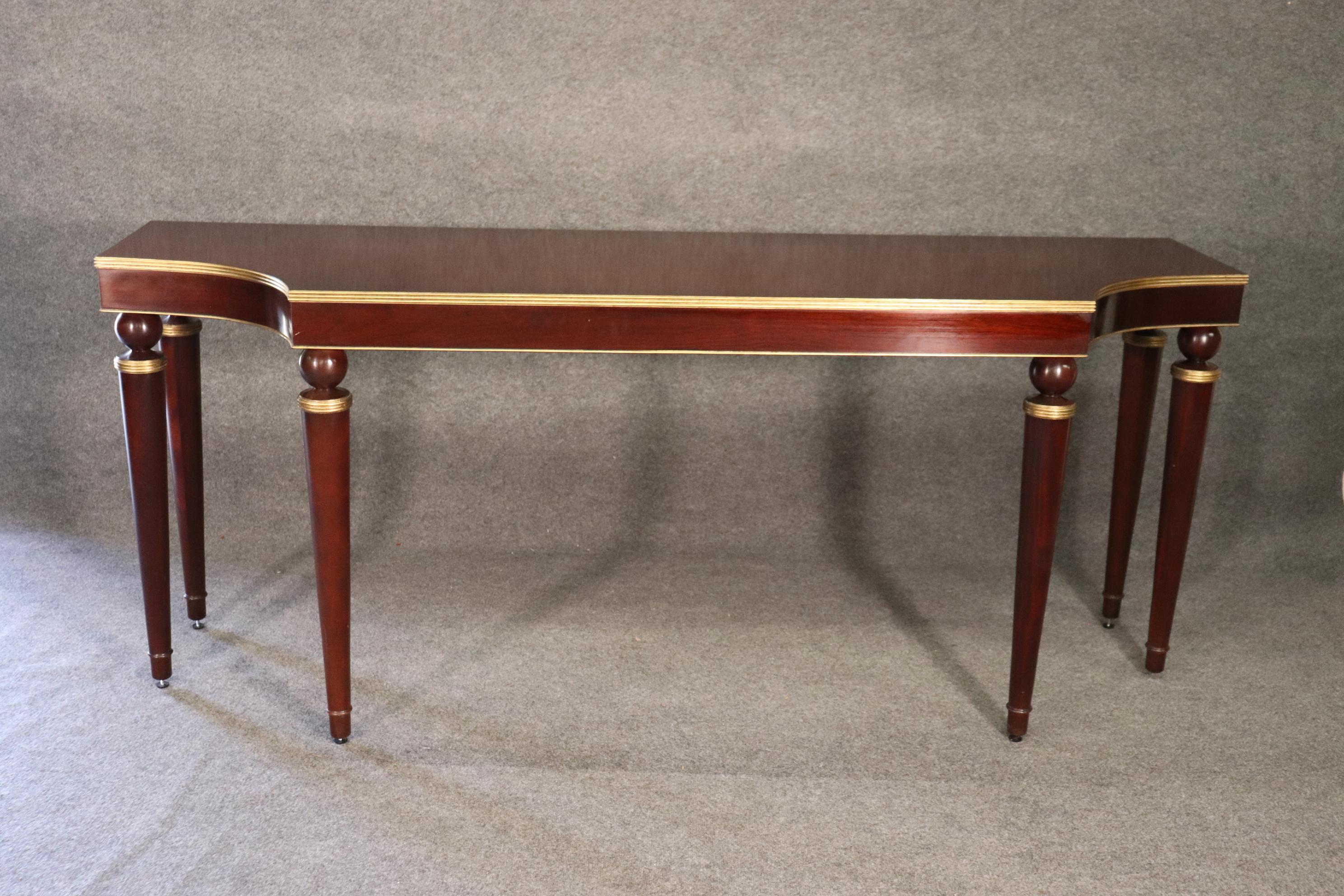 This is a gorgeous Barbara Barry for Baker furniture console or sofa table. The table is finished on both sides so ity is a true sofa table. The table is in very good condition and measures 84 inches long x 24 inches deep x 35 tall. This is truly