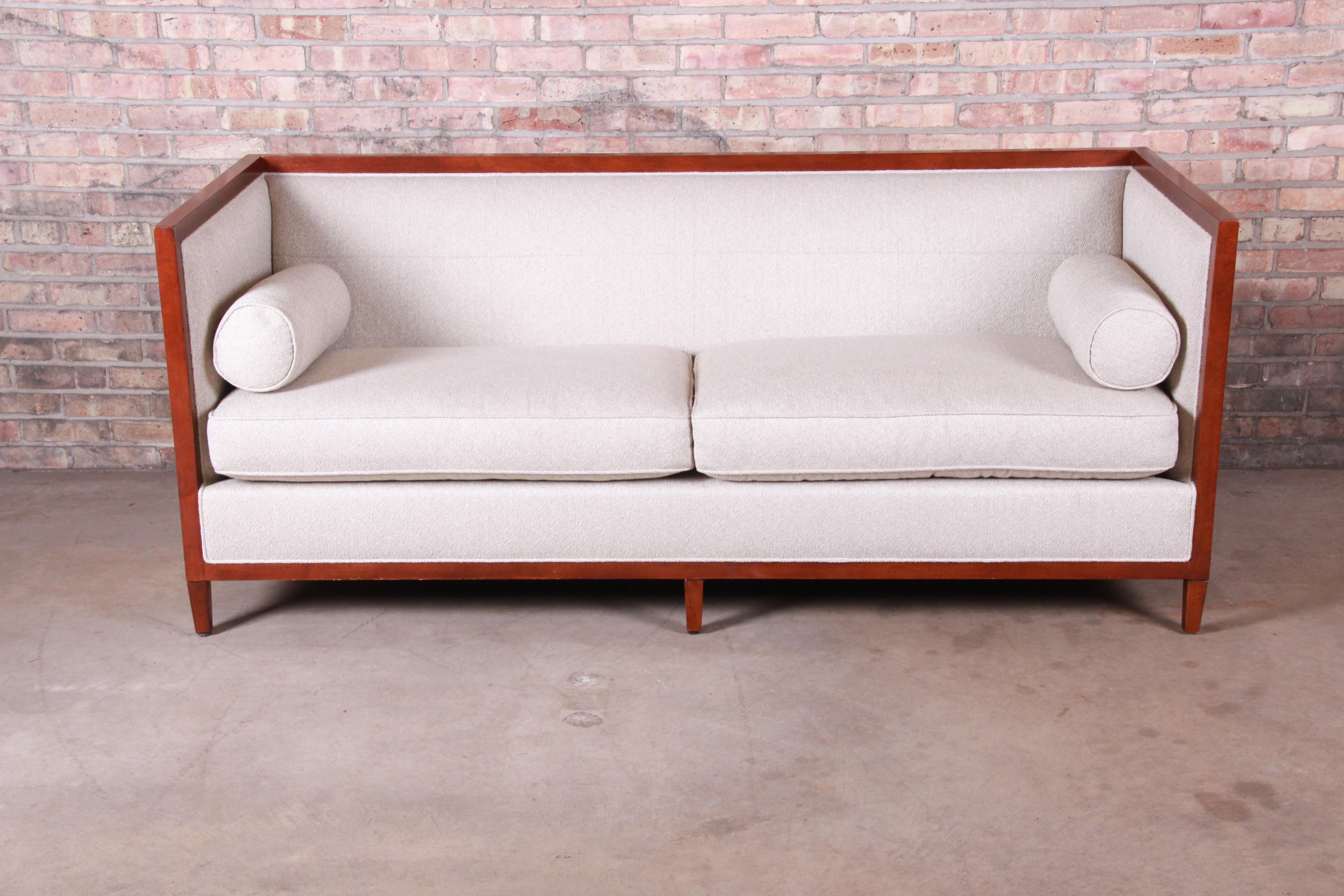 An exceptional modern contemporary sofa

By Barbara Barry for Baker Furniture

USA, early 21st century

Mahogany frame, with down-filled upholstery.

Measures: 78