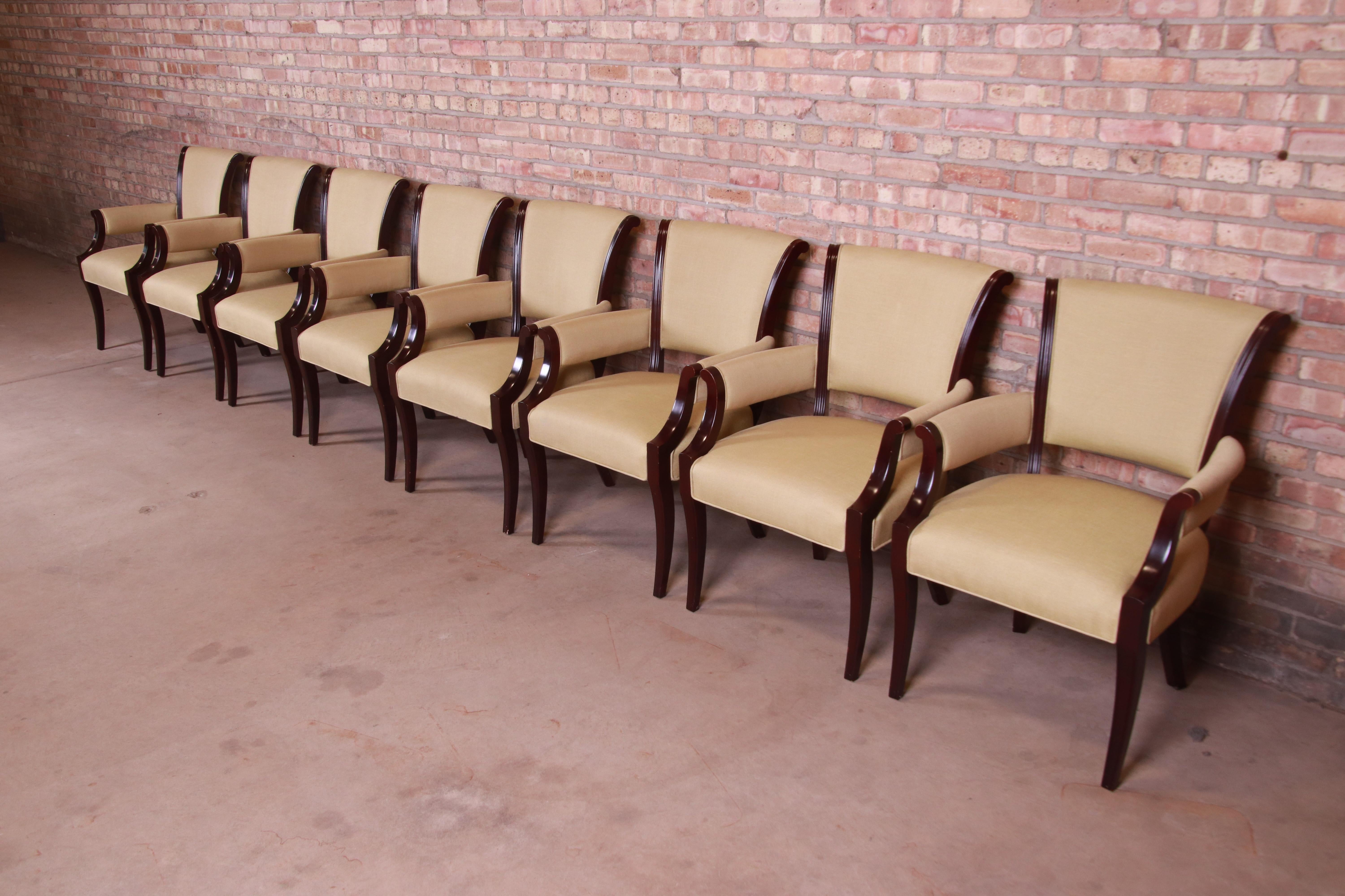 An exceptional set of eight modern Regency style club chairs or dining armchairs

By Barbara Barry for Baker Furniture

USA, 1990s

Solid dark mahogany frames, with light yellow upholstery.

Measures: 25.13