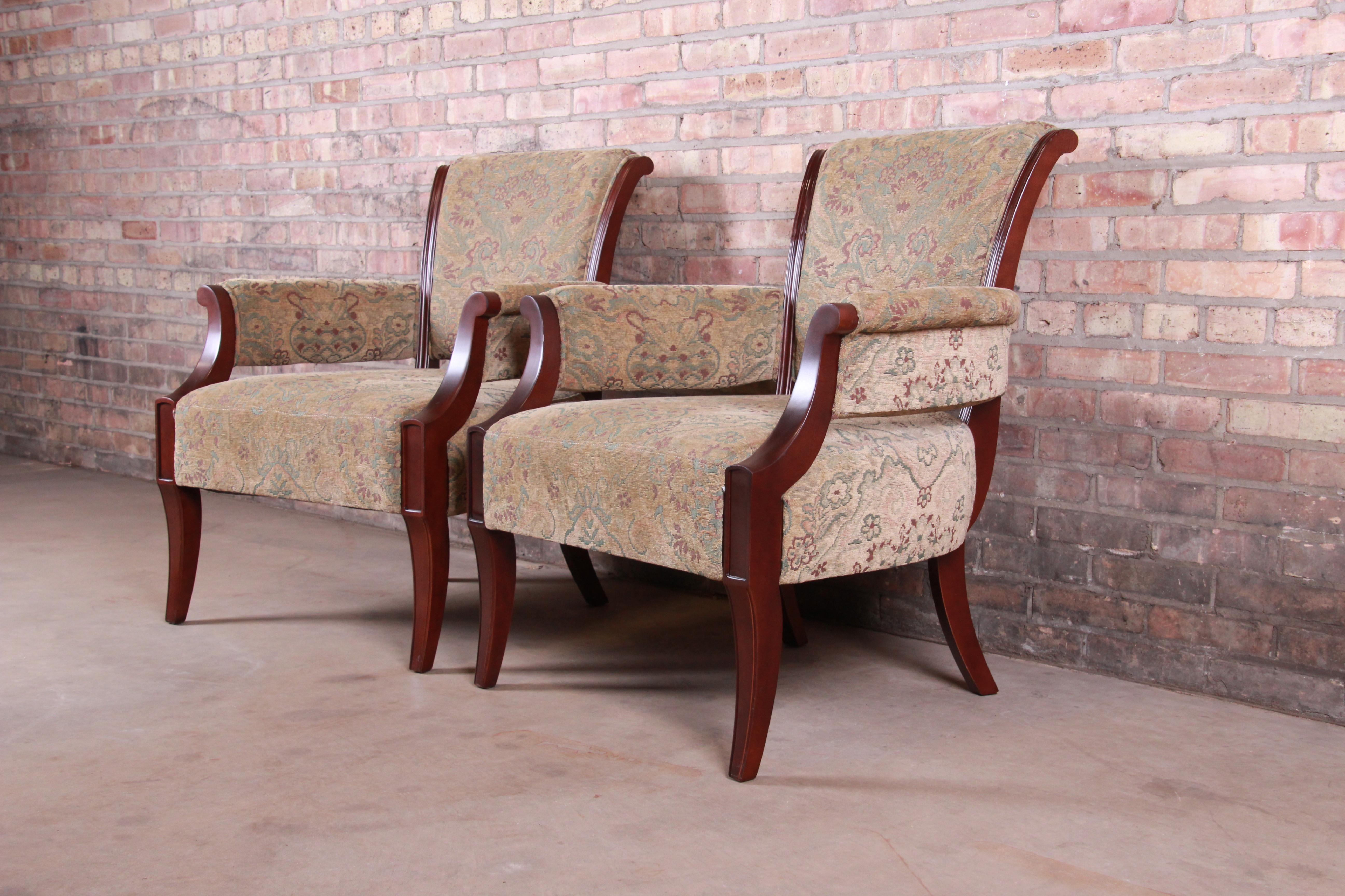 An exceptional pair of modern upholstered club or lounge chairs

By Barbara Barry for Baker Furniture

USA, circa 1990s

Mahogany and upholstery.

Measures: 29.25