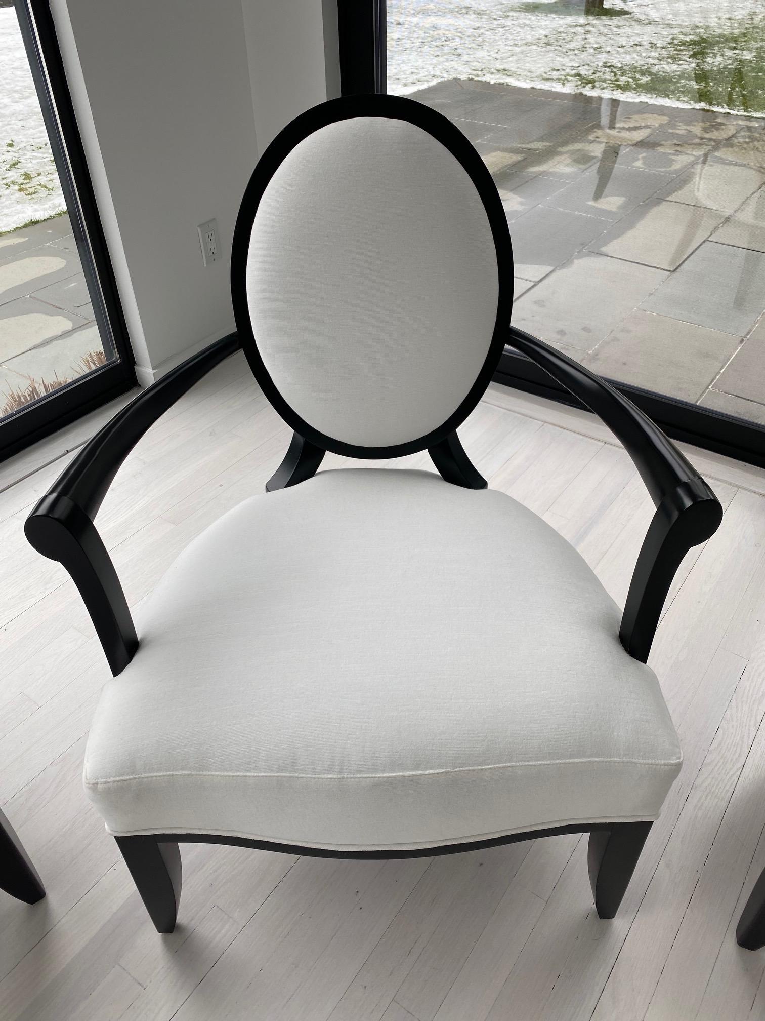 Barbara Barry for Baker Furniture Company Regency Style Oval X-Back Lounge Arm Chair
These beautiful and comfortable lounge chairs are in mint condition, recently reupholstered in white velvet which contrasts nicely against the black frames. Very