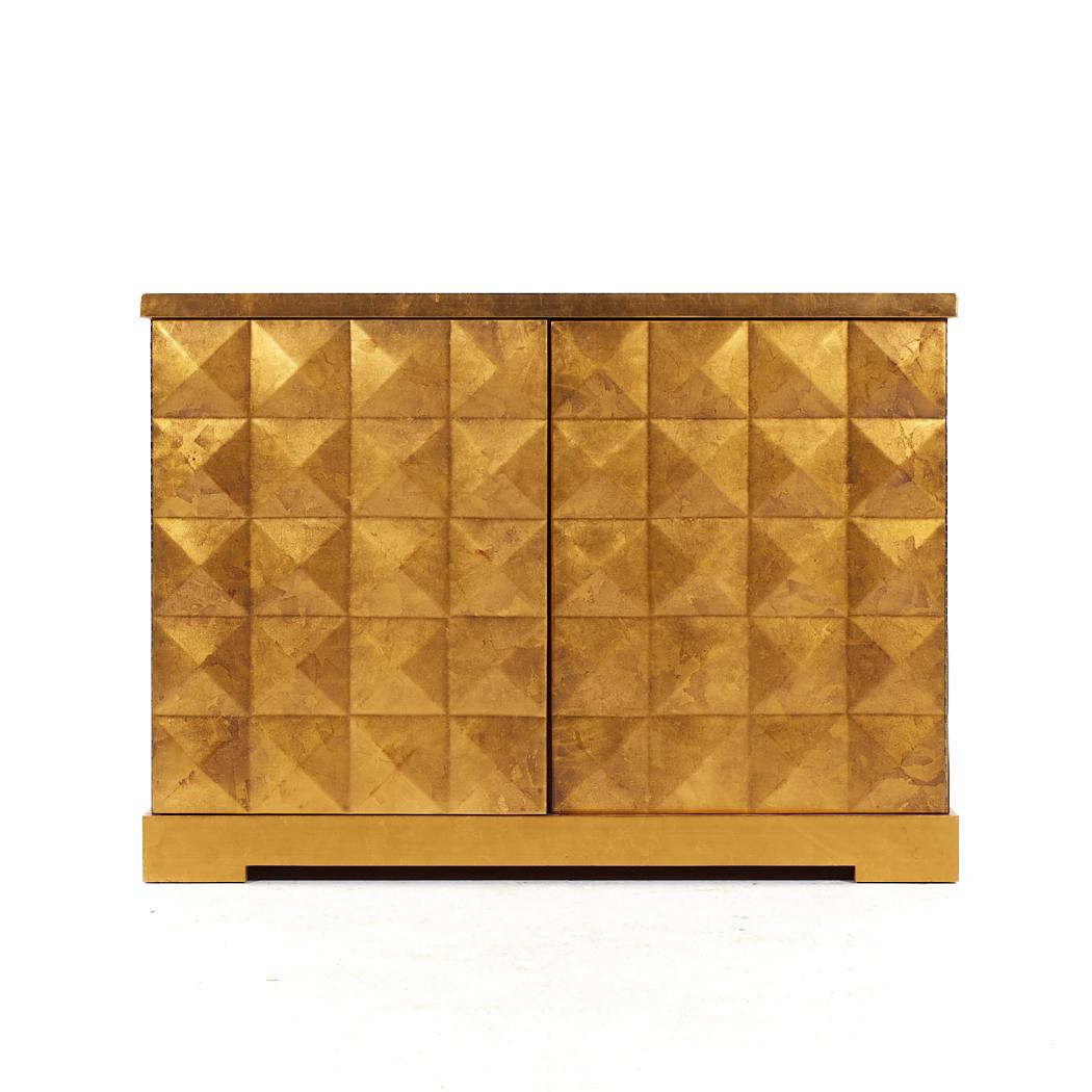 Barbara Barry for Baker Gold Leaf Cabinet Credenza

This credenza measures: 49.25 wide x 18.75 deep x 35.5 inches high

All pieces of furniture can be had in what we call restored vintage condition. That means the piece is restored upon purchase so