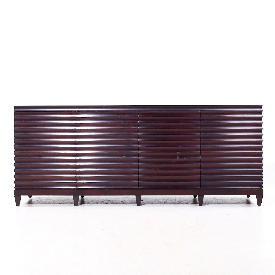 Barbara Barry for Baker Mahogany Fluted Sideboard Credenza

This credenza measures: 84 wide x 22 deep x 34.25 inches high

We take our photos in a controlled lighting studio to show as much detail as possible. We do not Photoshop out