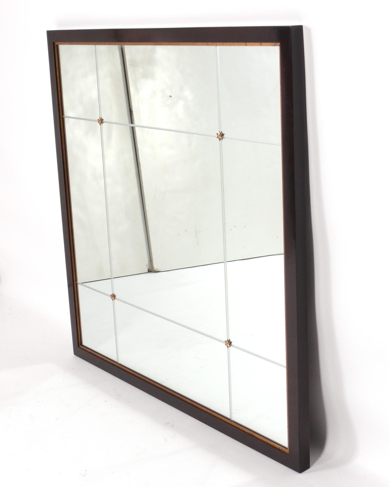 Elegant square mirror, designed by Barbara Barry for Baker, circa 2000s. This mirror was recently removed from the legendary Carlyle Hotel in NYC. It measures an impressive 44