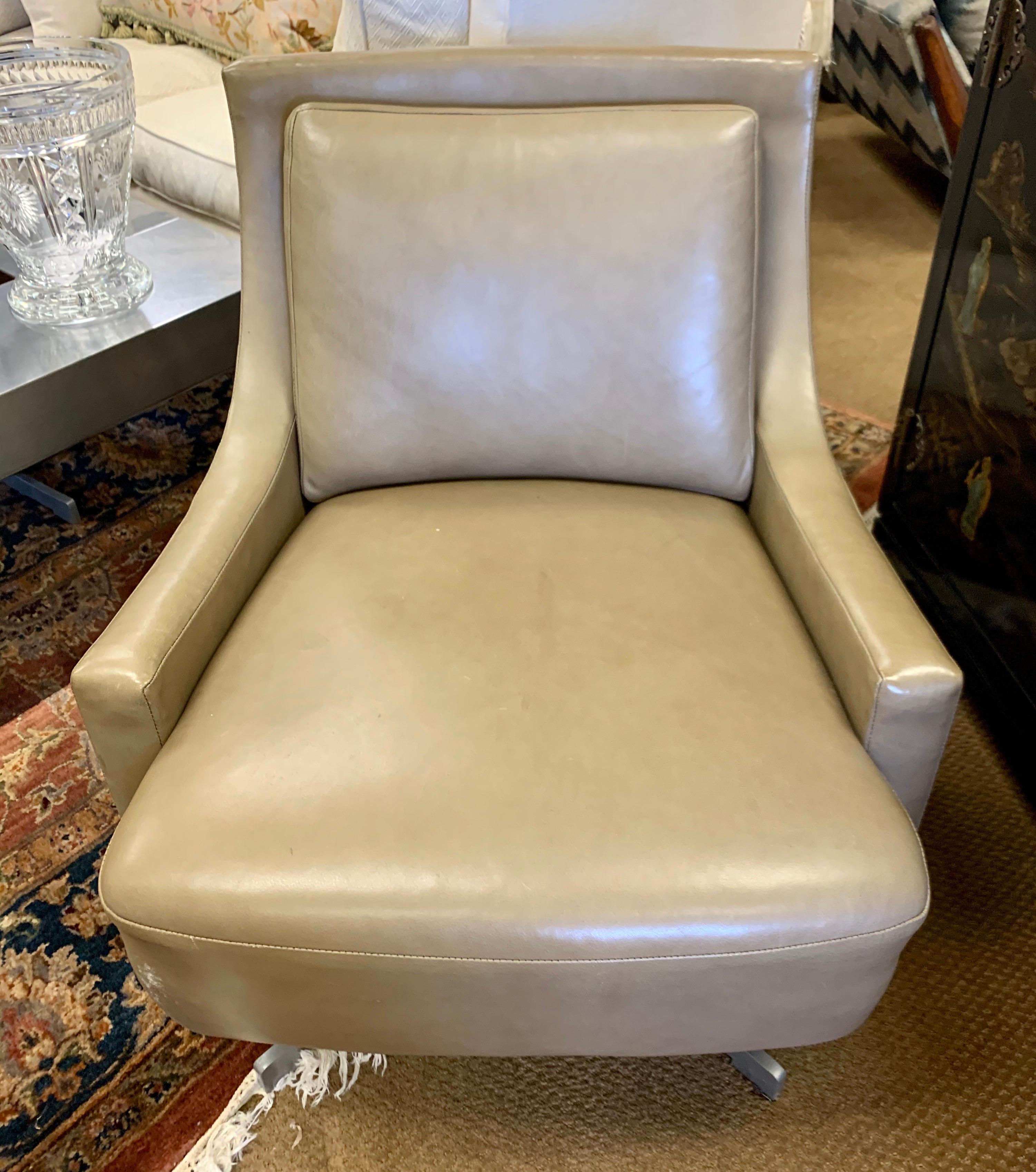 An elegant lighter brown/taupe low profile leather chair designed by Barbara Barry for HBF.
Very comfortable and sturdy with with swivel option. Leather has been broken in nicely,
circa early 2000s.