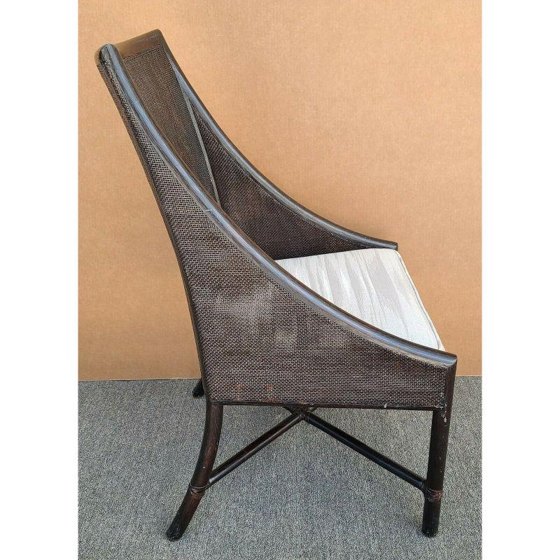 For full item description be sure to click on CONTINUE READING at the bottom of this listing.

Offering one of our recent palm beach estate fine furniture acquisitions of a Barbara Barry for McGuire double caned rattan dining desk arm chair

Color