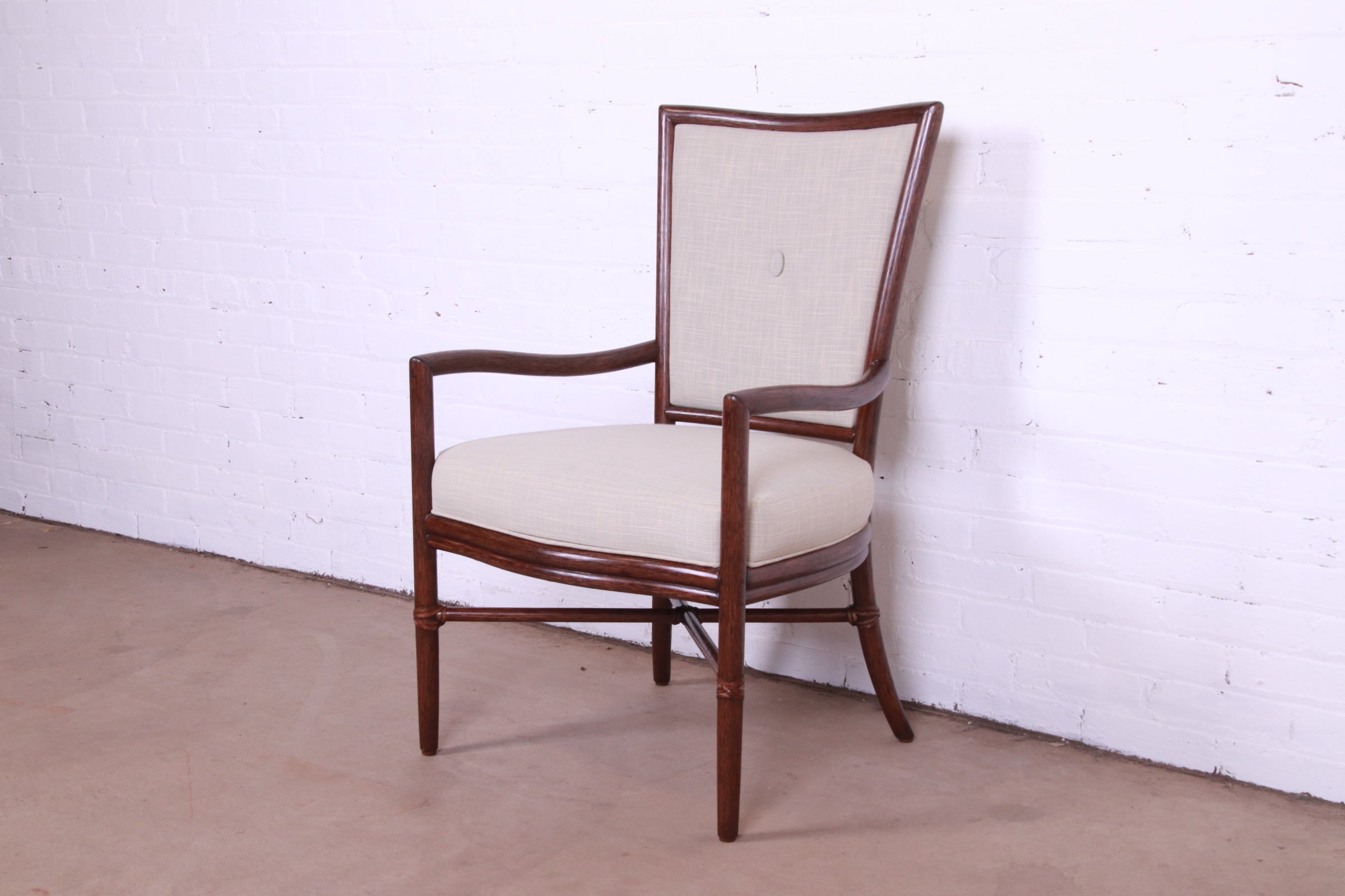 A gorgeous Hollywood Regency Organic Modern x-base armchair or club chair

By Barbara Barry for McGuire

USA, Circa 1990s

Rattan frame in bamboo form, with leather binding and upholstered seat and back.

Measures: 24