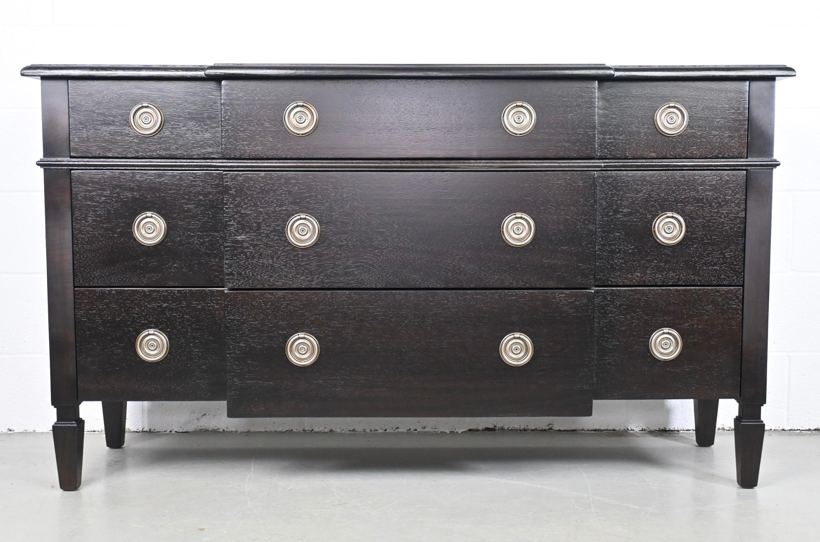 Barbara Barry for Milling Road Dark Maple dresser or credenza

Milling Road Baker Furniture, Italy, 1990s

Measures: 59.5 Wide x 19.25 Deep x 34.38 High.

Three-drawer dresser or credenza with manufacturer lined drawers.

Professionally