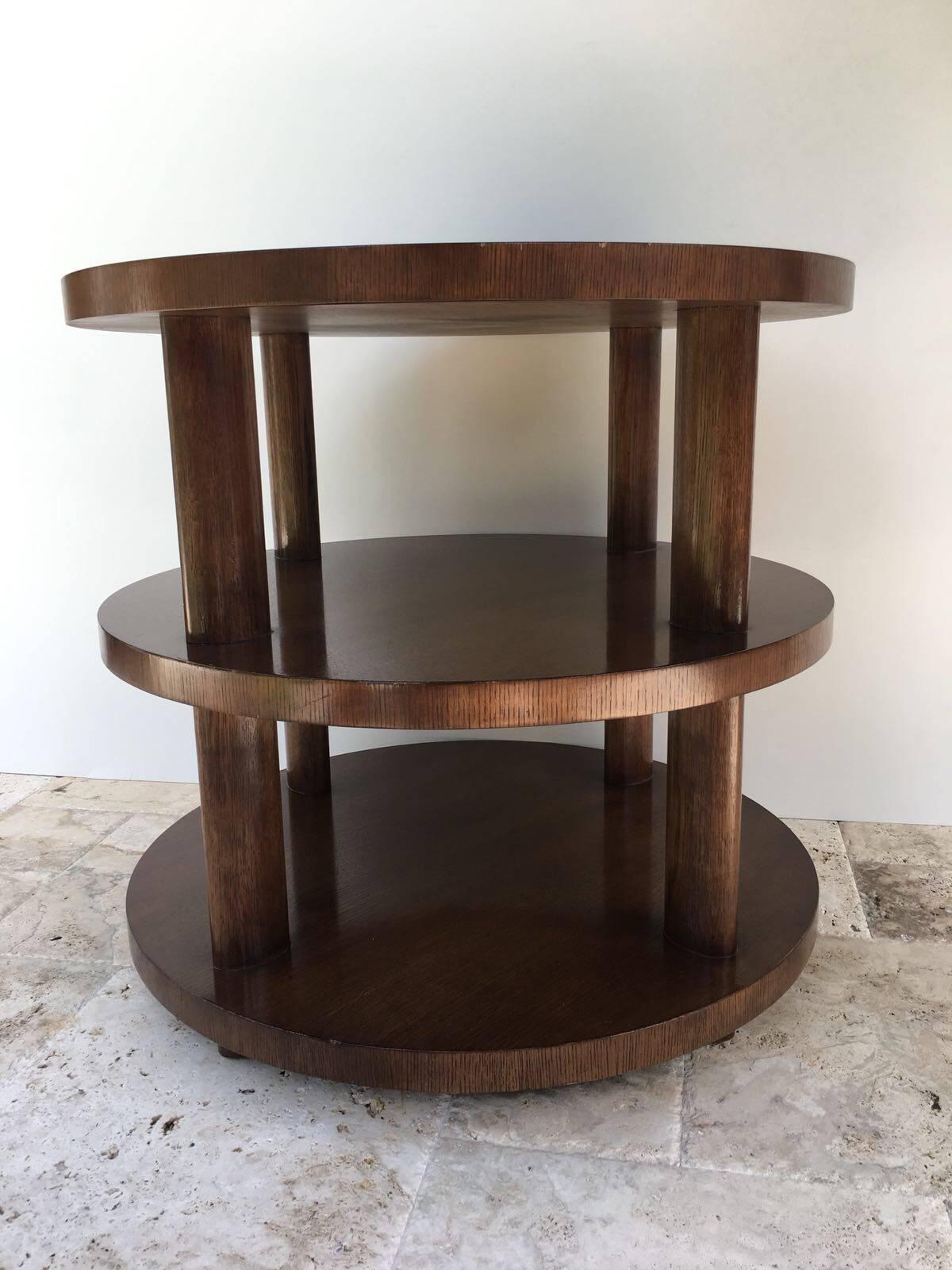 Inspired by a Charlotte Perriand design, this outstanding three-tiered table is solid mahogany with column details in the Art Deco style.
Labelled to underside.