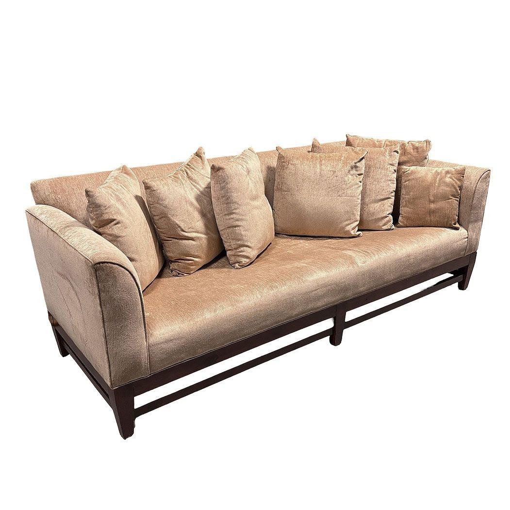 A living room set made of a cotton/linen upholstered 3-seat daybed sofa with a matching pair of lounge chairs, designed by Barbara Barry for Baker-McGuire Furniture. Features contemporary out-swept flared arms with a richly finished fluted wood base