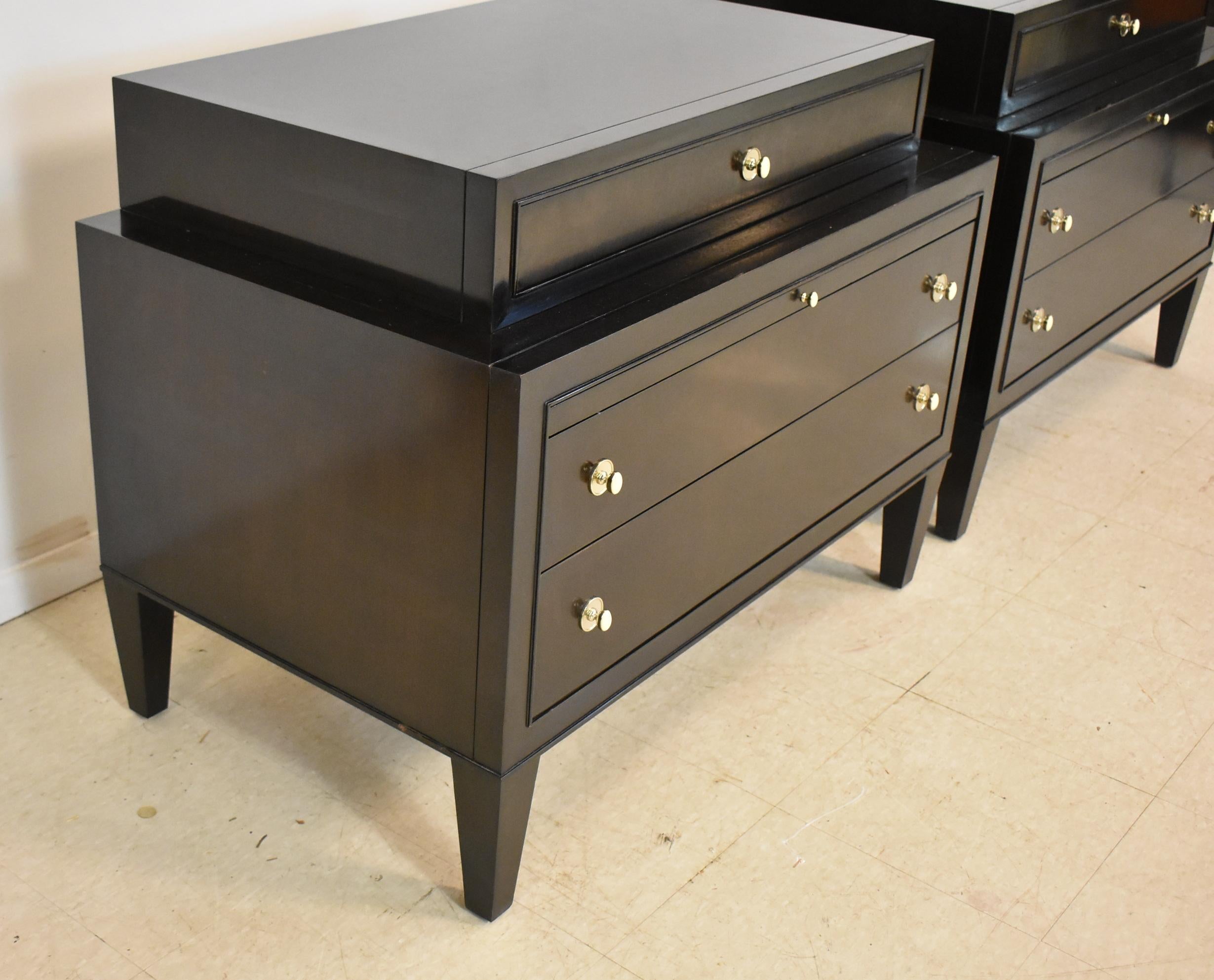 This pair of elegant night stands feature dovetailed drawer construction, dark mahogany finish, felt lined top drawer and pull out shelf. Designed by American designer Barbara Barry for Henredon circa late 1990's- to early 2000's. Some light general