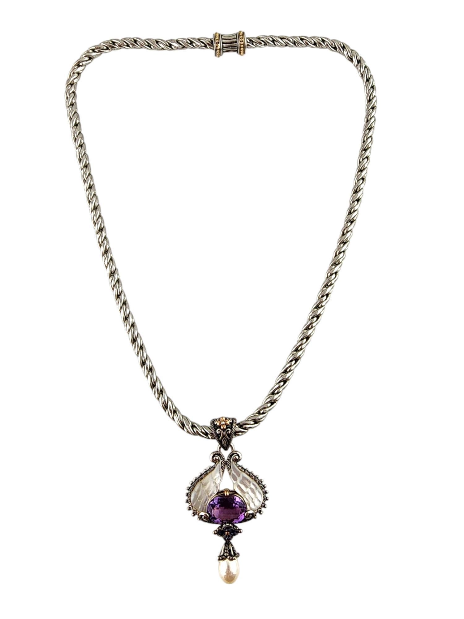 Barbara Bixby Sterling Silver & 18K Yellow Gold Mother of Pearl Pendant Necklace

This gorgeous necklace by amazing designer Barbara Bixby features a stunning angel wings mother of pearl flower iolite amethyst pendant crafted from sterling silver