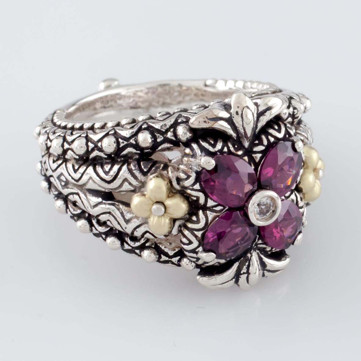 Gorgeous Textured Ring by Barbara Bixby
Features Four Oval Cut Rhodolite Garnet in Floret Shape
18k Yellow Gold Accents
Total Mass = 14.6 grams
Size 7
Gorgeous Piece!