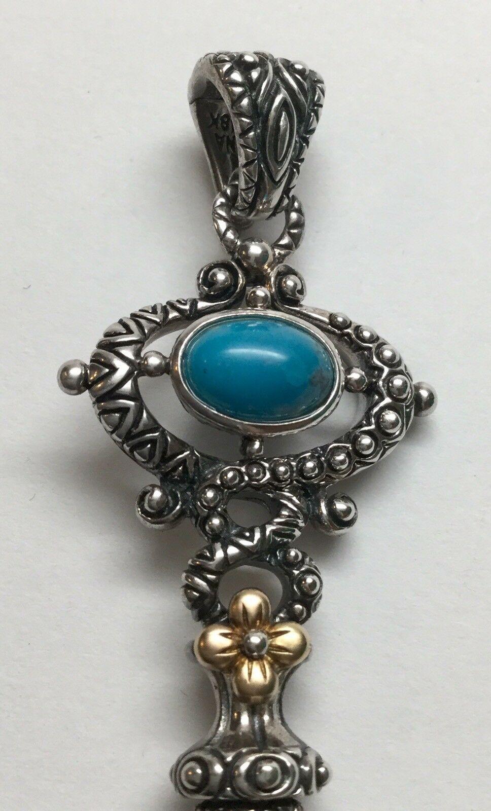 Barbara Bixby sterling silver 18K turquoise key pendant enhancer.

Marked: Bixby 925 18K

Measures: 2 1/4