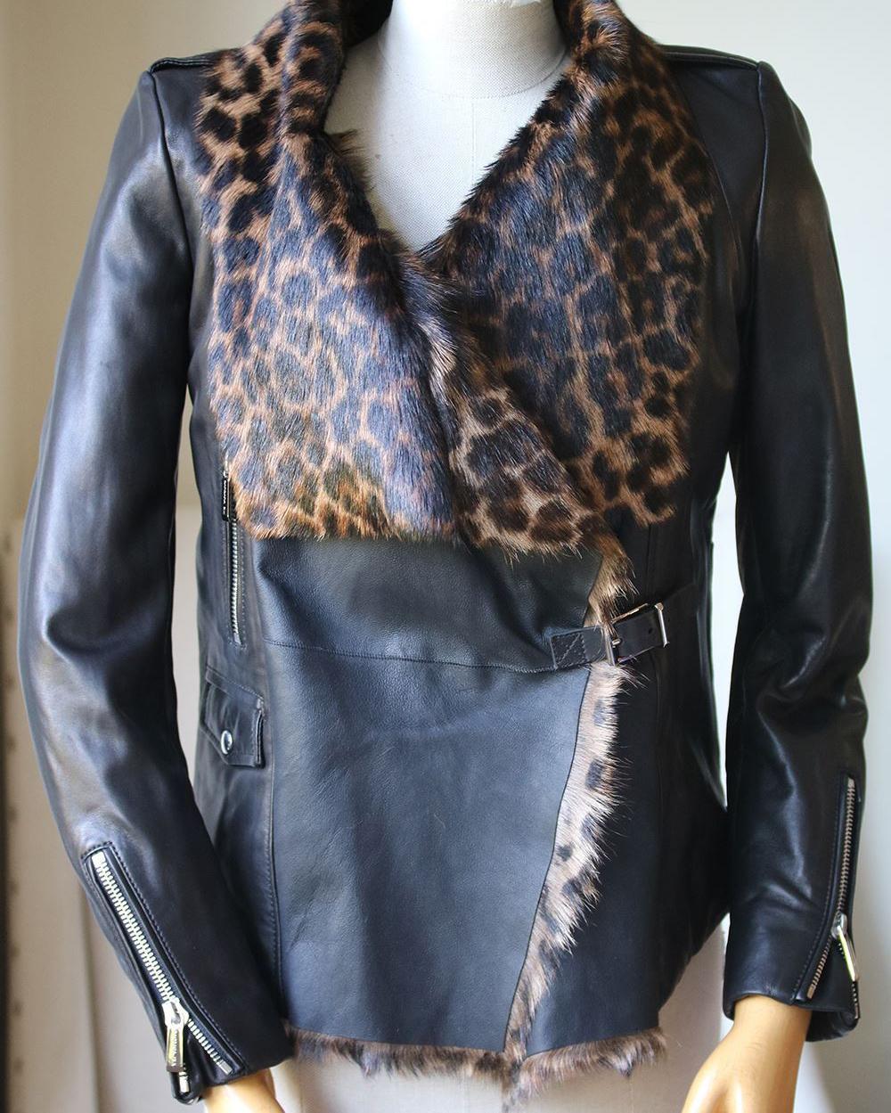 Black goatskin and lambskin leopard-print fur jacket from Barbara Bui. Leopard-print shearling fur. Belted fastening at the side. 100% Lambskin. Lining: 100% goat skin shearling. Colour: black. 

Size: FR 38 (UK 10, US 6, IT 42)

Condition: As new