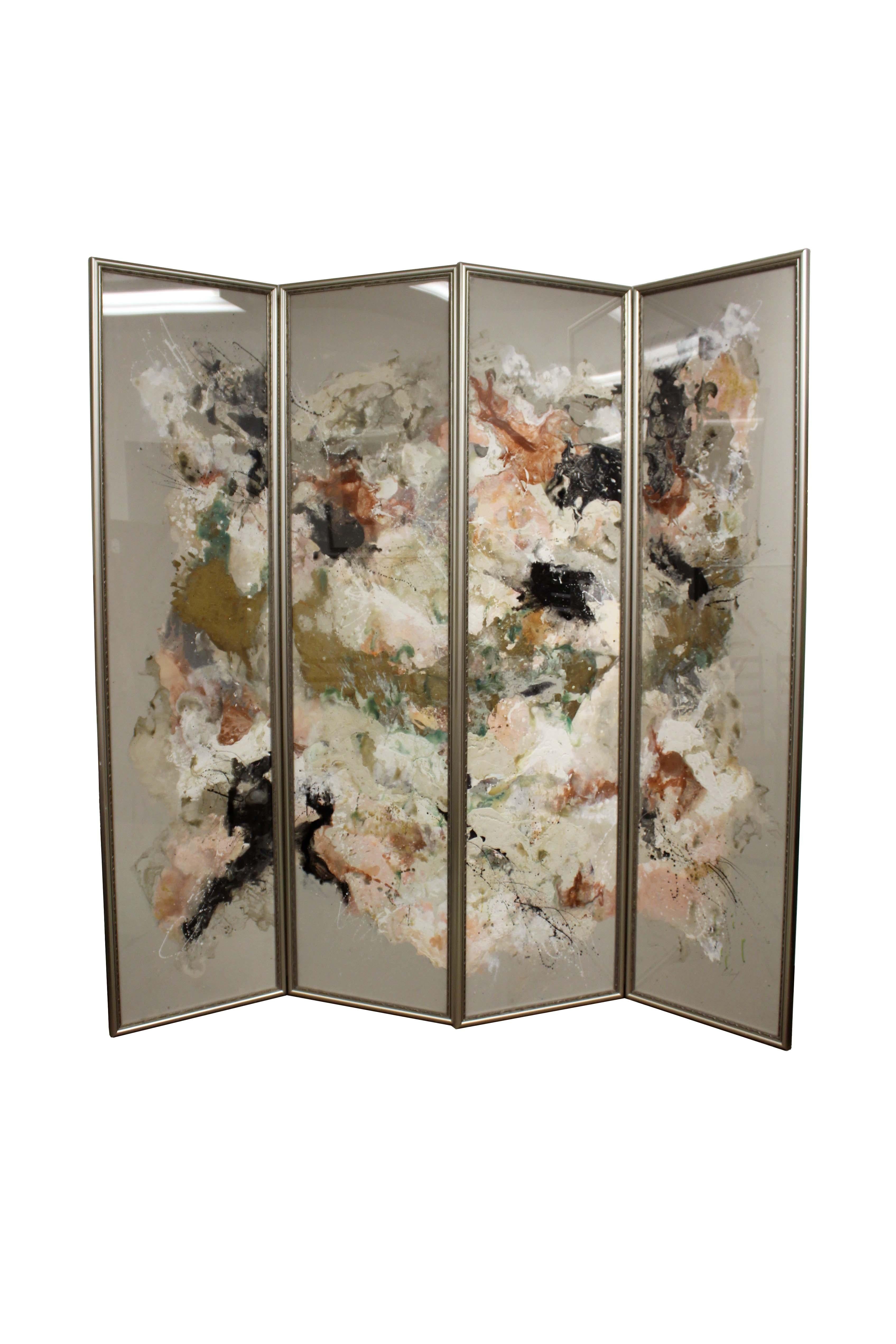 A unique contemporary 4 panel room divider hand-crafted by Michigan-based artist Barbara Coburn. Each panel is a one-of-a-kind painting abstract painting on paper that is framed under glass with a delicate metal frame. The subtle floral abstract