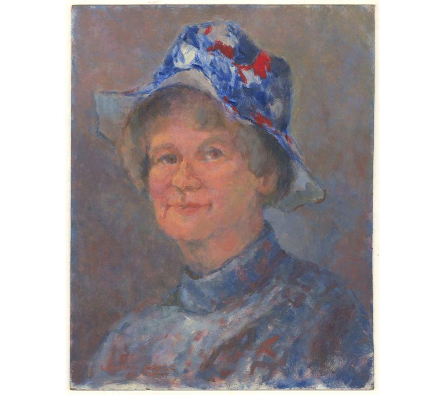 A jolly self portrait of Barbara Doyle in her jubilee hat and matching jumper. The artist smiles a soft smile with a direct gaze. The painting has been signed and dated in the lower left corner and there is a label at the reverse with the artist's