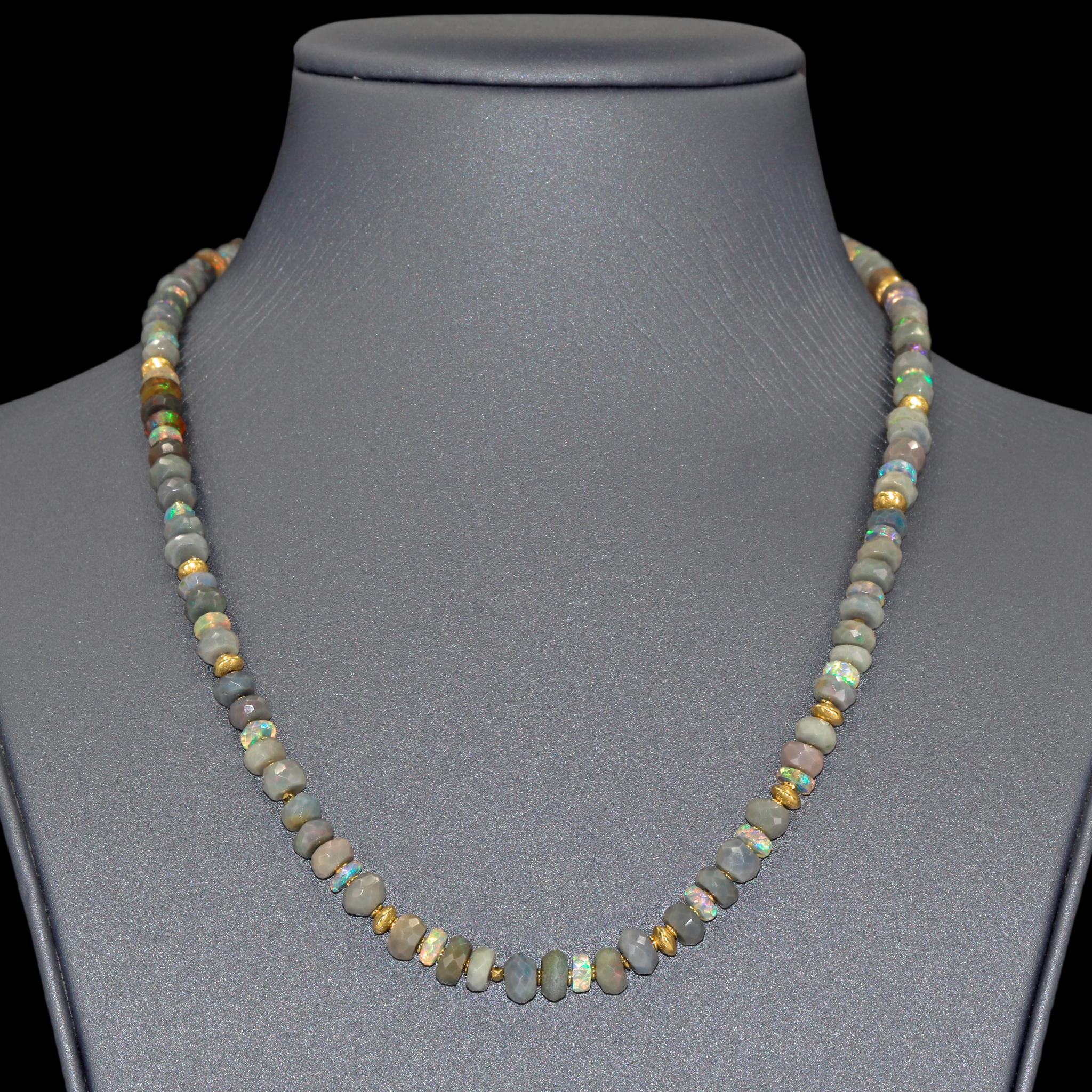 Opal Necklace hand-fabricated by award winning jewelry artist Barbara Heinrich featuring a stunning assortment of Australian and Ethiopian faceted opal rondels totaling 48.50 carats, each individually flanked by assorted 18k yellow gold beads and