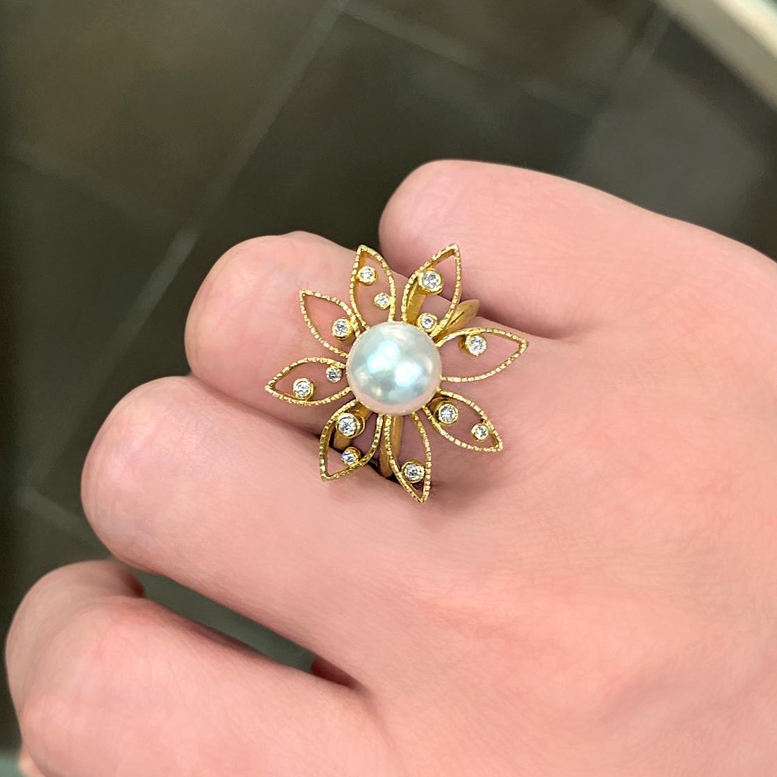 One of a Kind Daisy Ring handcrafted by master jewelry maker Barbara Heinrich in matte and polished 18k yellow gold featuring a beautiful, iridescent 8.3mm natural white pearl surrounded by 0.16 total carats of round-brilliant-cut white diamonds,