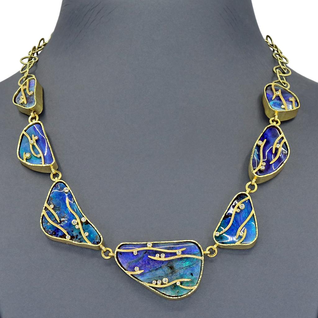 One of a Kind Boulder Opal Waves Necklace hand-fabricated by award-winning jewelry maker Barbara Heinrich featuring seven perfectly matched, solid Australian boulder opal gemstones with spectacular, bold color and fiery flashes of neon blue and