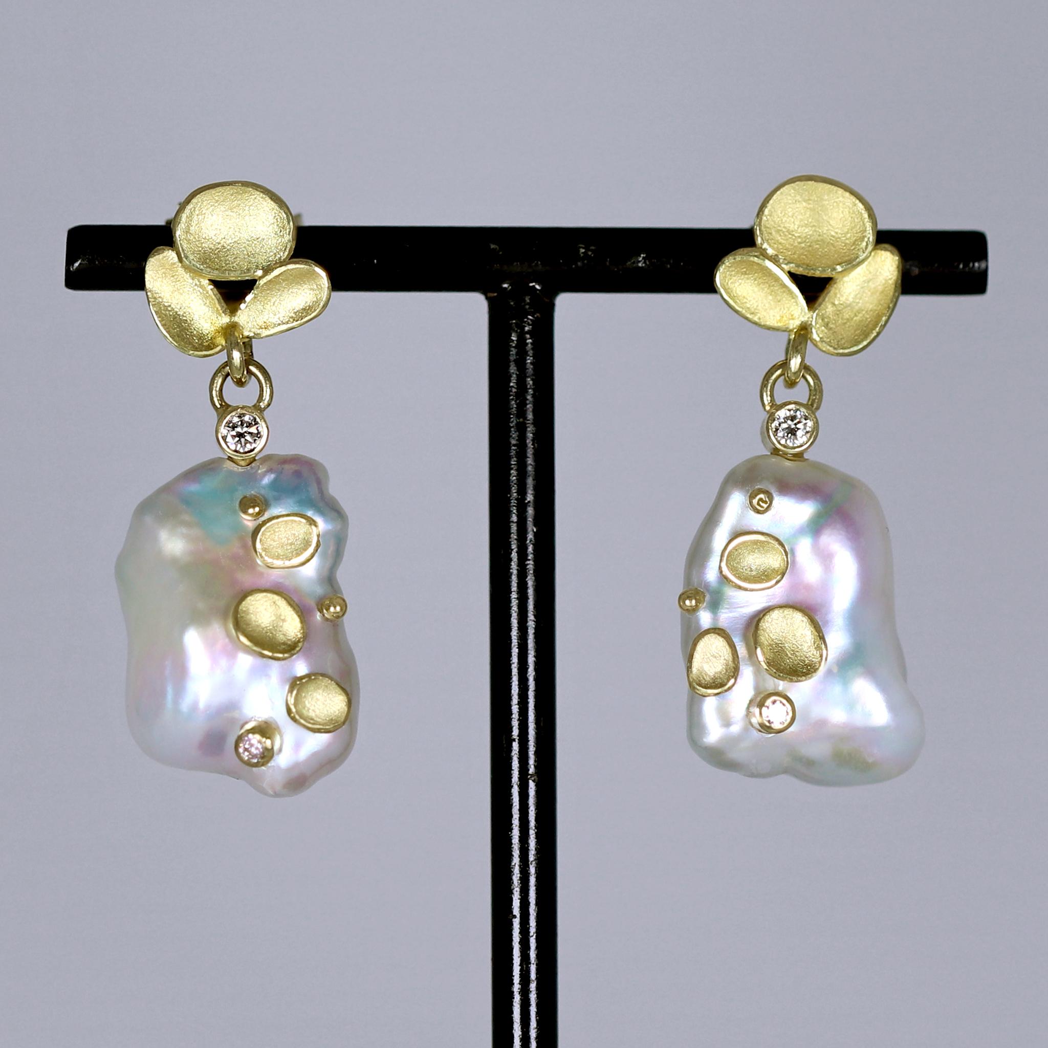 One of a Kind Triple Shell Top Earrings hand-fabricated by award-winning jewelry maker Barbara Heinrich showcasing two gorgeous matched white freshwater pearl with stunning iridescence and orient. The phenomenal pearls are accented on with Barbara's