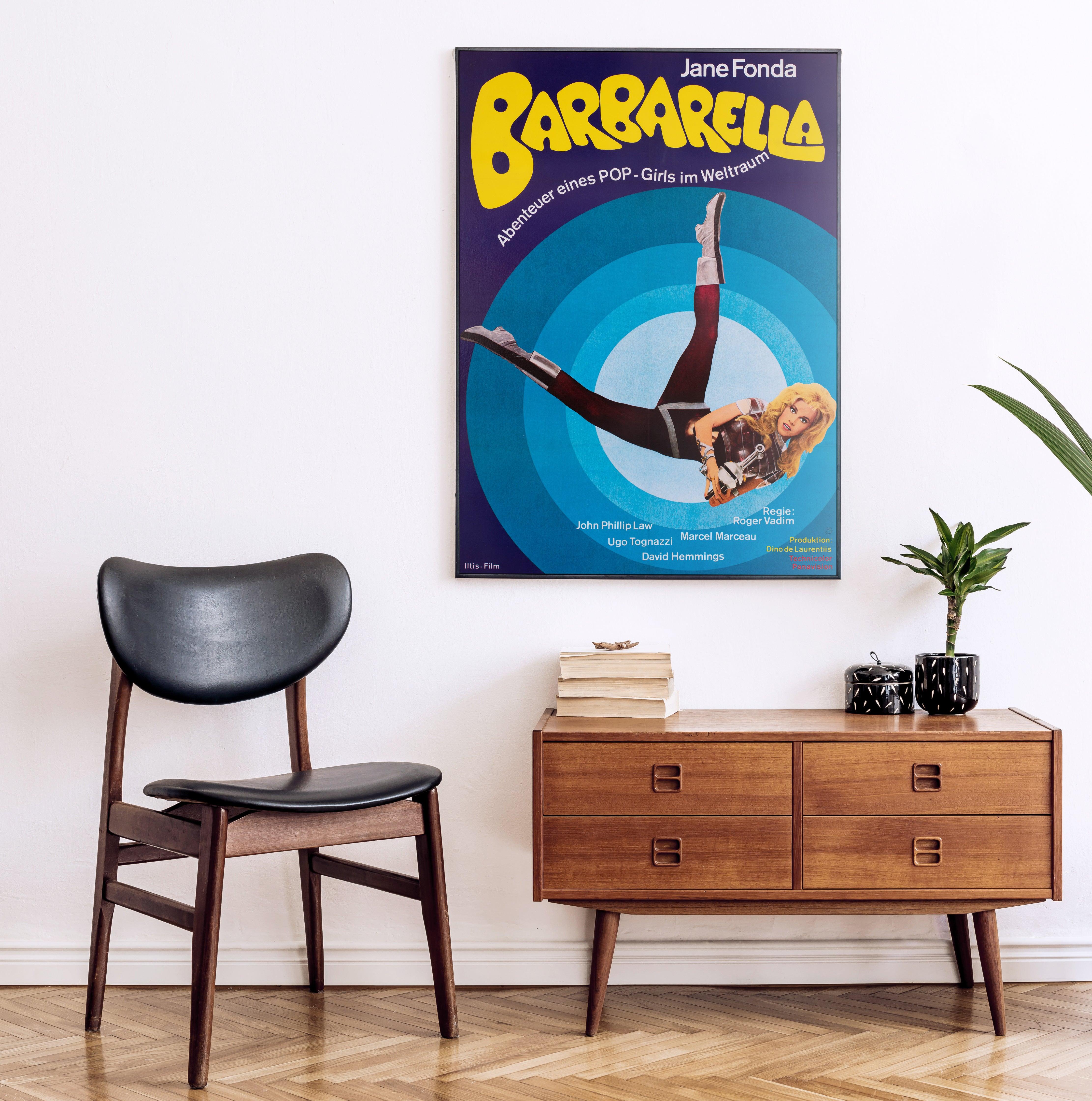 We love the colours and pop-art styling on this German 70s re-release film poster for 60s classic Barbarella. Barbarella is a film that inspired some wonderfully poster imagery and this one is no exception.

This original vintage movie poster has
