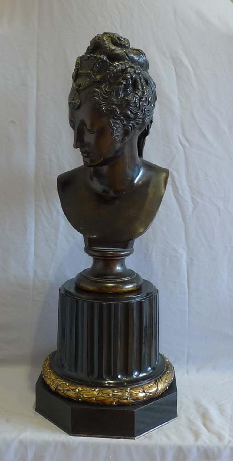 French Barbedienne bronze bust of classical lady on ormolu mounted black marble base. For Sale