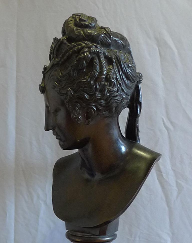Bronze Barbedienne bronze bust of classical lady on ormolu mounted black marble base. For Sale