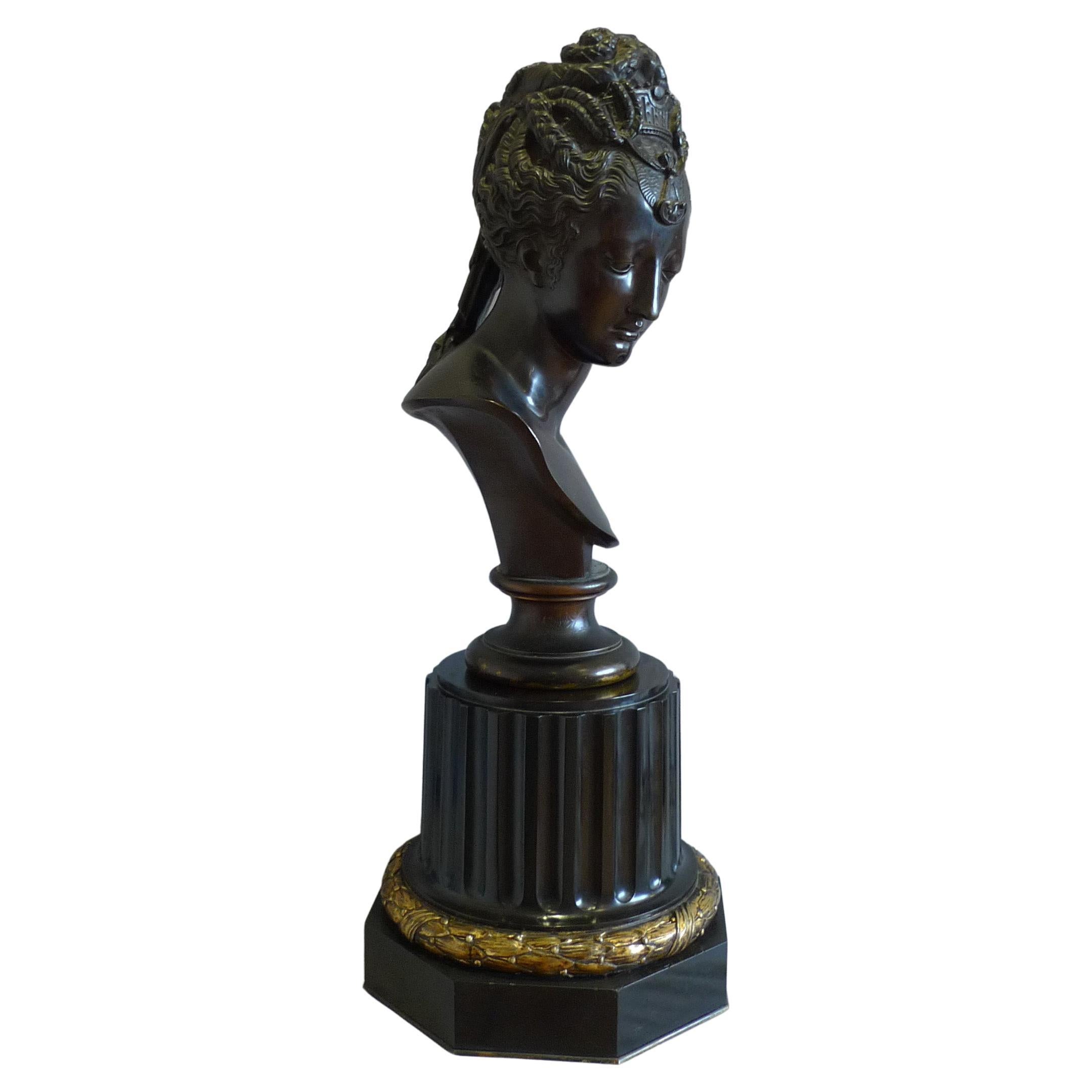 Barbedienne bronze bust of classical lady on ormolu mounted black marble base. For Sale