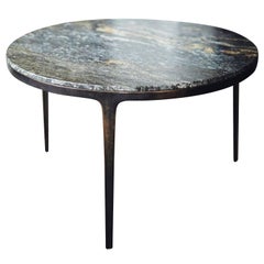 Table ronde Barbera, base en bronze massif moderne avec plateau en pierre de granit