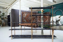 Estantería Barbera 'Herodutus', latón fundido y mármol