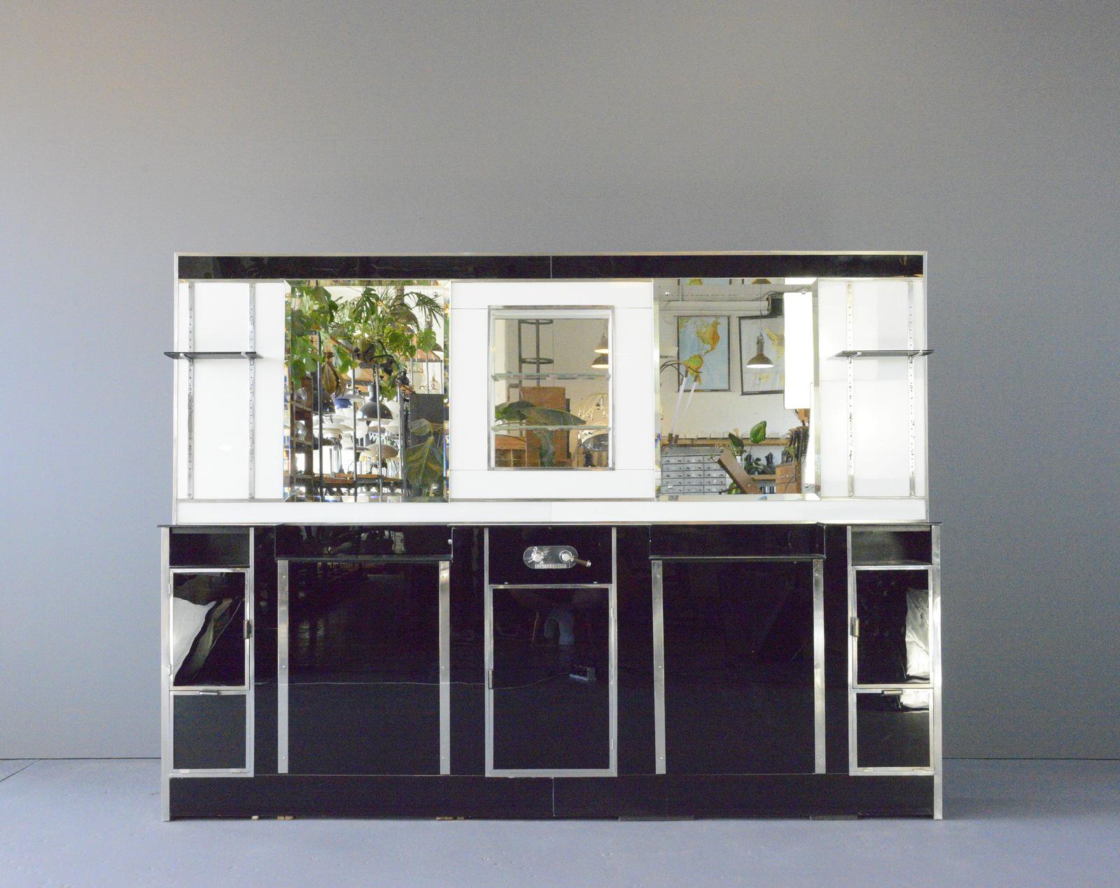 - Black and opal glass
- Nickel trims
- Shaving socket and light switch
- Multiple storage compartments and shelves
- Beveled mirrors
- Working taps which a flexi pipe can be brought over the top of the unit
- In two parts
- English ~