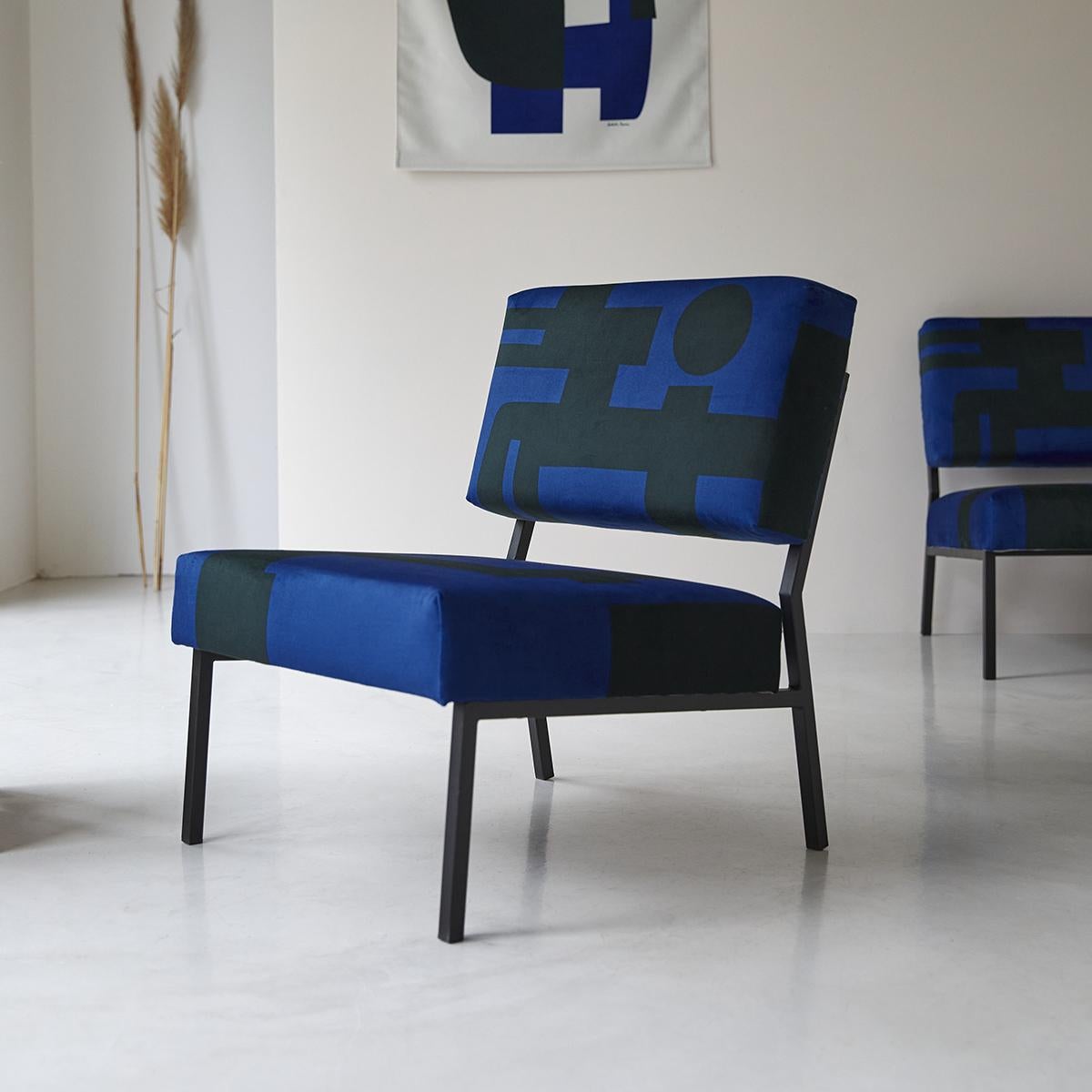 Barbican blue O2 armchair by Babel Brune
Dimensions: D 63 x W 54 x H 67 cm, Seat H 35 cm.
Material: Suede velvet printed in France, steel.

Inspired by the style of the 70's, the Barbican Blue Armchair, designed for Tikamoon, offers a unique