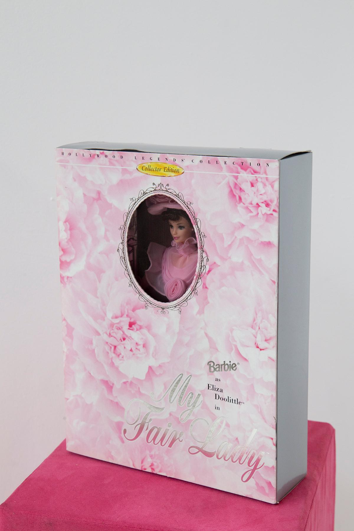 Hollywood Legends Collection Barbie as Eliza Doolittle in My Fair Lady. This is Barbie as Eliza in her pink dress once she became a lady and visits Henry Higgins' mother. As New in the Box. 
Limited edition Reproduction of the 1959 edition of