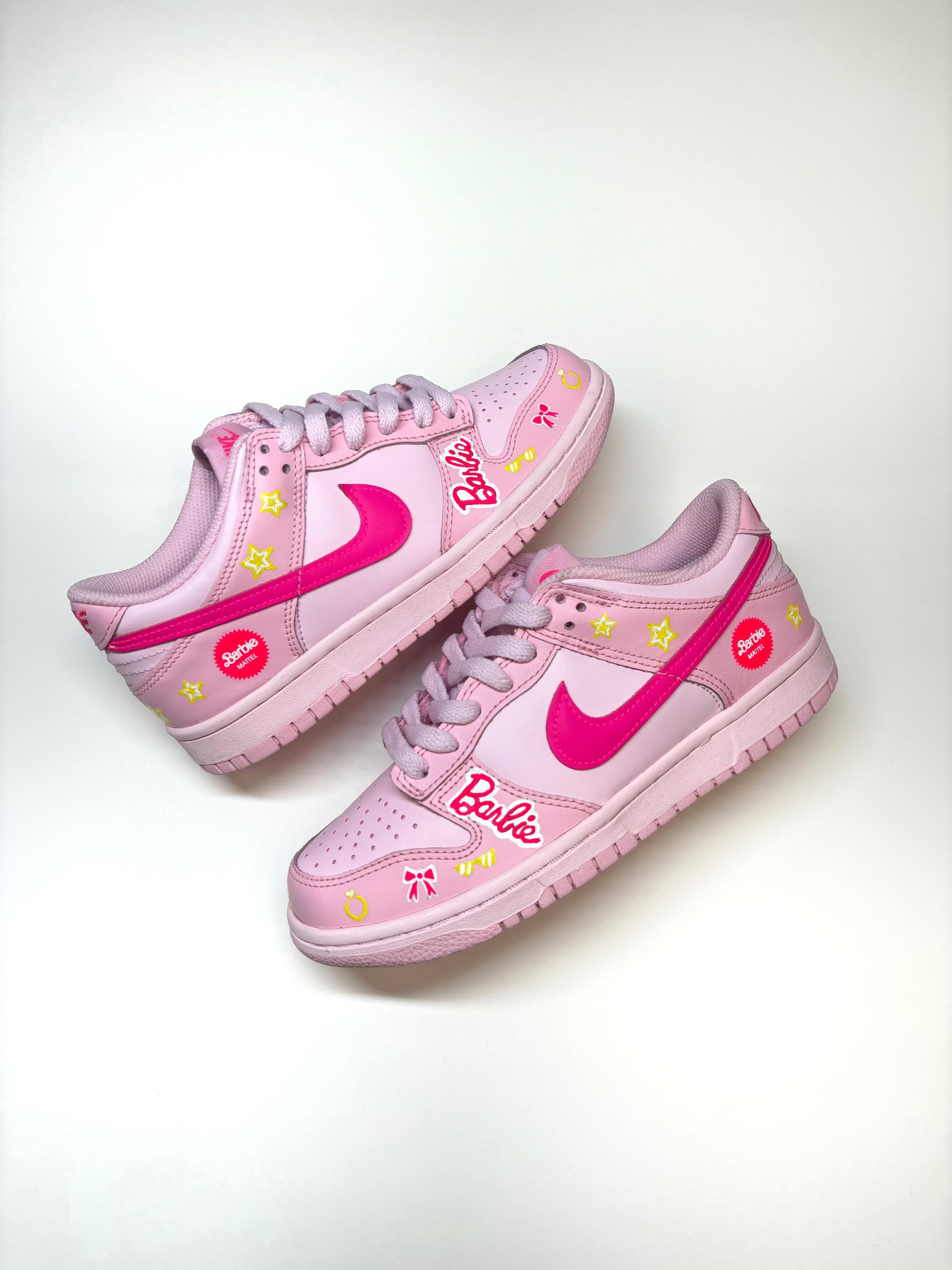 These Barbie Mattel Nike Dunk Concept inspired sneakers are hand-painted by Reed Revesz.  They are the perfect accessory for any Barbie fan.  Reed Revesz sneakers are custom made and typically take between 2-4 weeks to produce if we do not have your