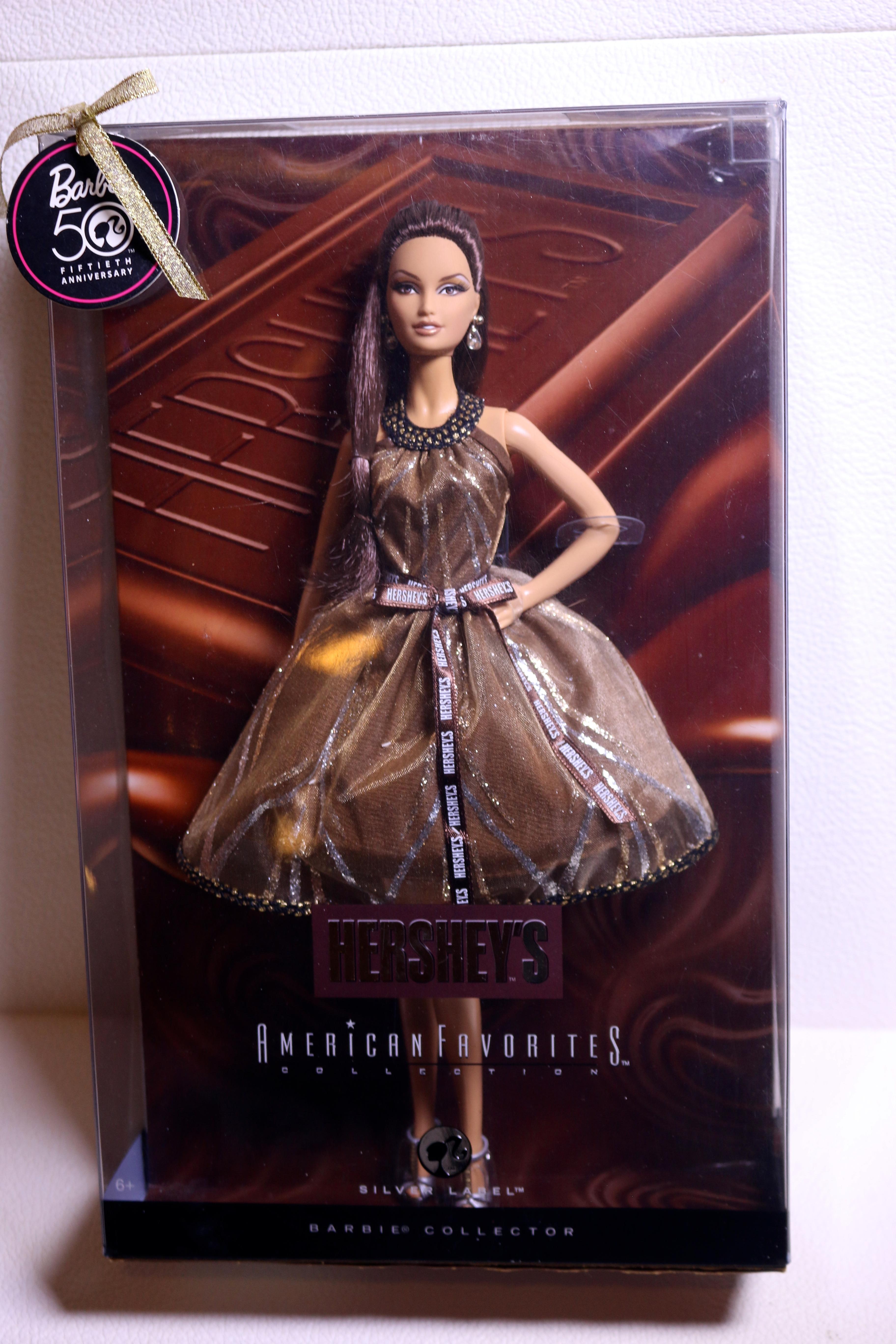 Hershey's being one of the iconic American brands, Barbie embodies its brand spirit. 2009 American Favorites collection Hershey's Barbie is a doll specially designed for chocolate lovers. The Barbie doll looks stylish in a brown mocha cocktail dress