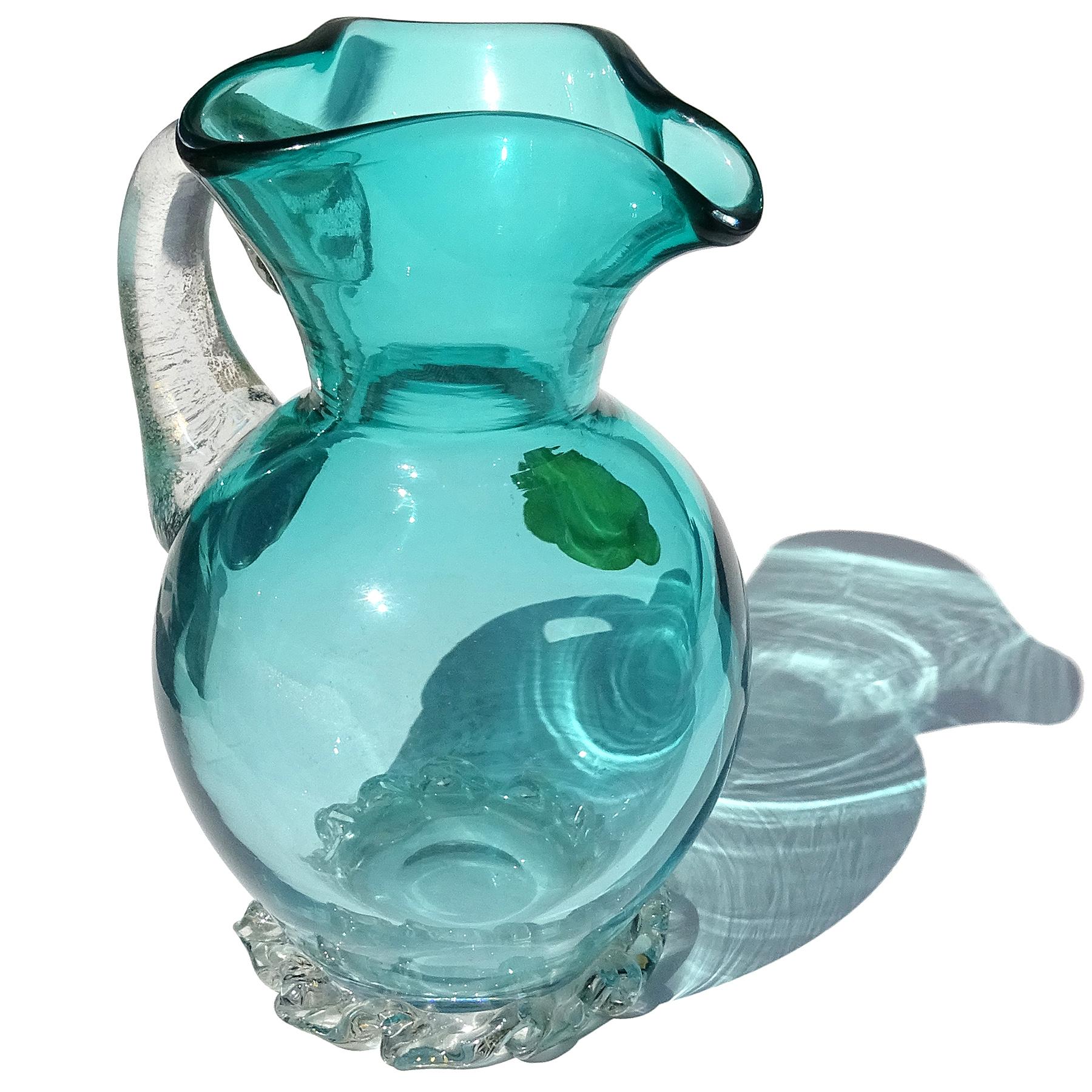 Beautiful vintage Murano hand blown aqua blue and gold flecks Italian art glass pitcher shape flower vase. Documented to designer Alfredo Barbini, with original worn 