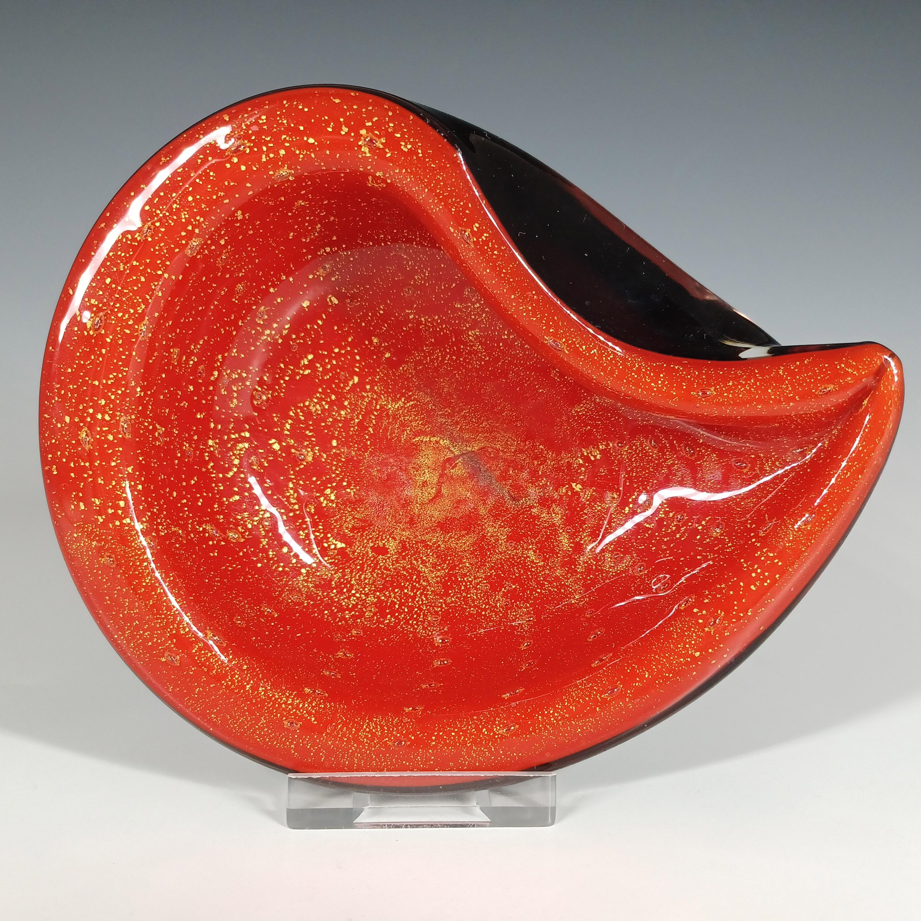 This is a magnificent 1950/60's Venetian biomorphic glass bowl, made on the island of Murano, near Venice, Italy. Most likely made by Barbini. In a stunning combination of opaque red glass cased in black glass, with a wonderful controlled bubble