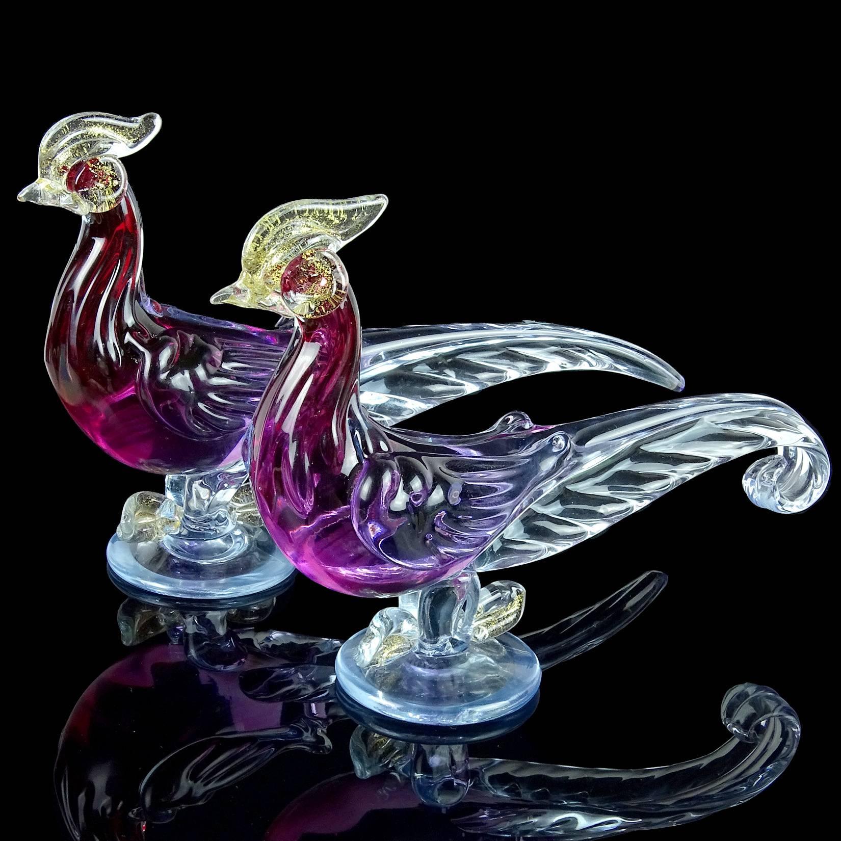 Beautiful vintage Murano hand blown Sommerso cranberry, purple to light blue and gold flecks Italian art glass pheasant bird sculptures. Documented to designer Alfredo Barbini. The male and female pair have gold flecks on their faces, eyes, beaks
