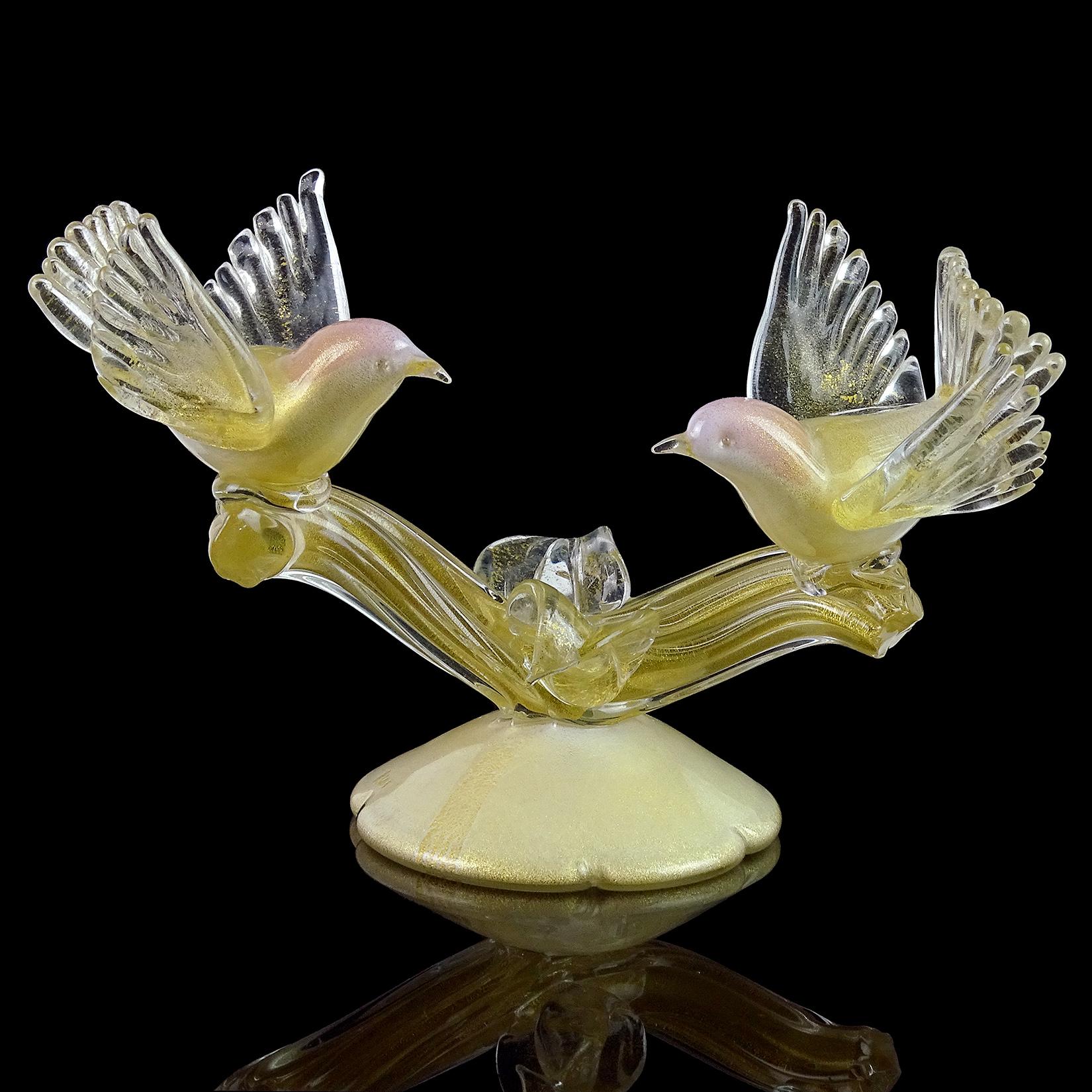 Beautiful Murano hand blown white, pink and gold flecks Italian art glass birds on branch sculpture. Documented as a Alfredo Barbini piece, circa 1950s, and published in his Weil ceramics and glass catalog. Profusely covered in gold leaf throughout.