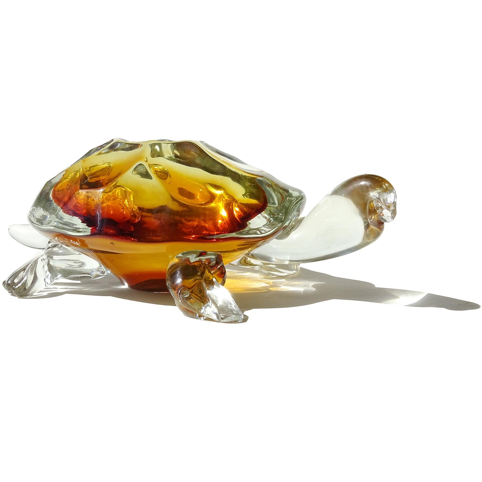 Beautiful and rare Murano hand blown Sommerso golden amber Italian art glass turtle sculpture. Documented, and signed by designer Alfredo Barbini, for Oggetti. The piece also has an edition number, 