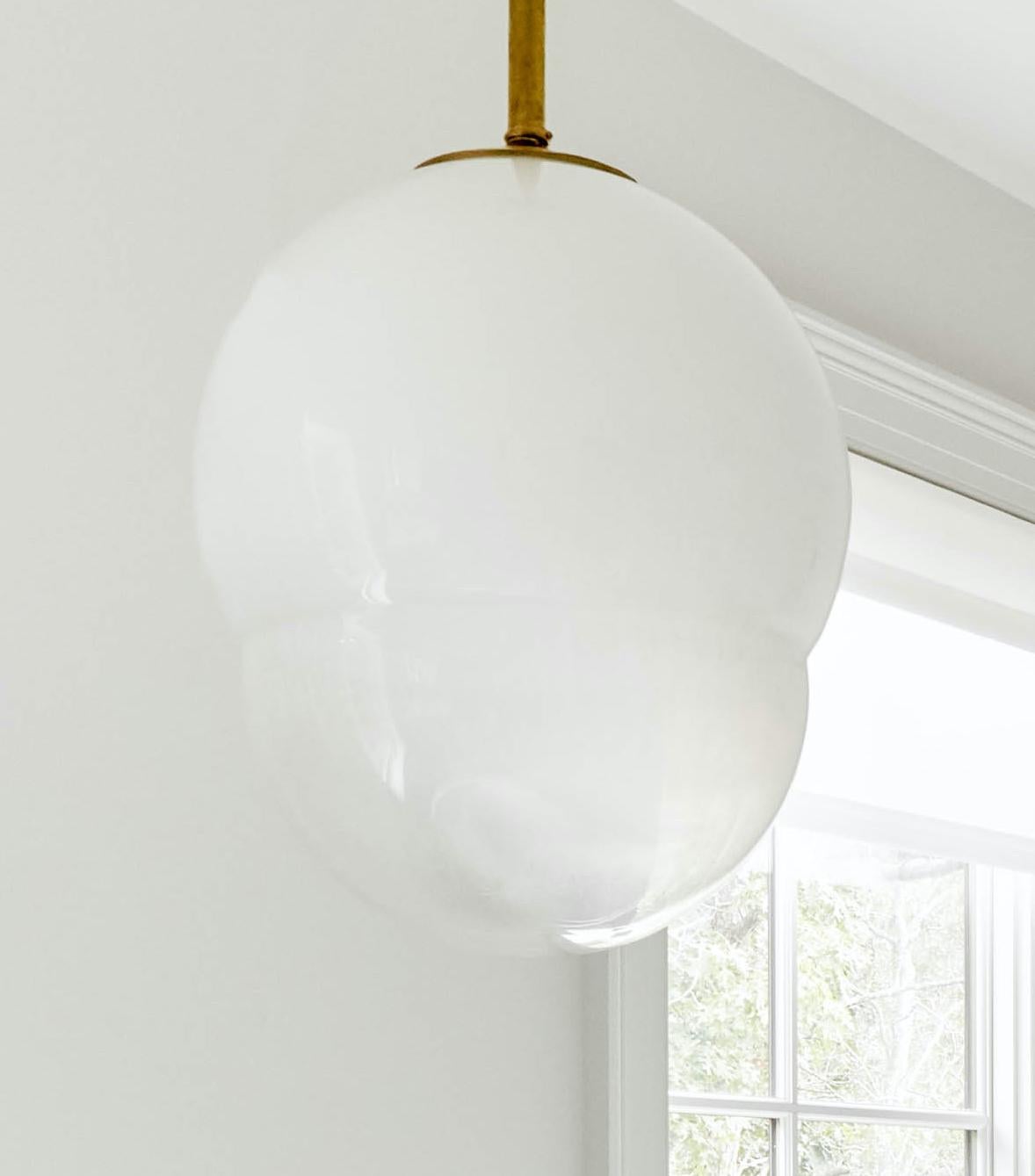 Barbini pendant light made of Murano opalescent glass and brass, circa 1970s. The ombre opalescence glass measures 20” height x 16” diameter and has an etched signature.

Images 4 - 6: Barbini Murano Opalescent Glass Pendant in situ courtesy of