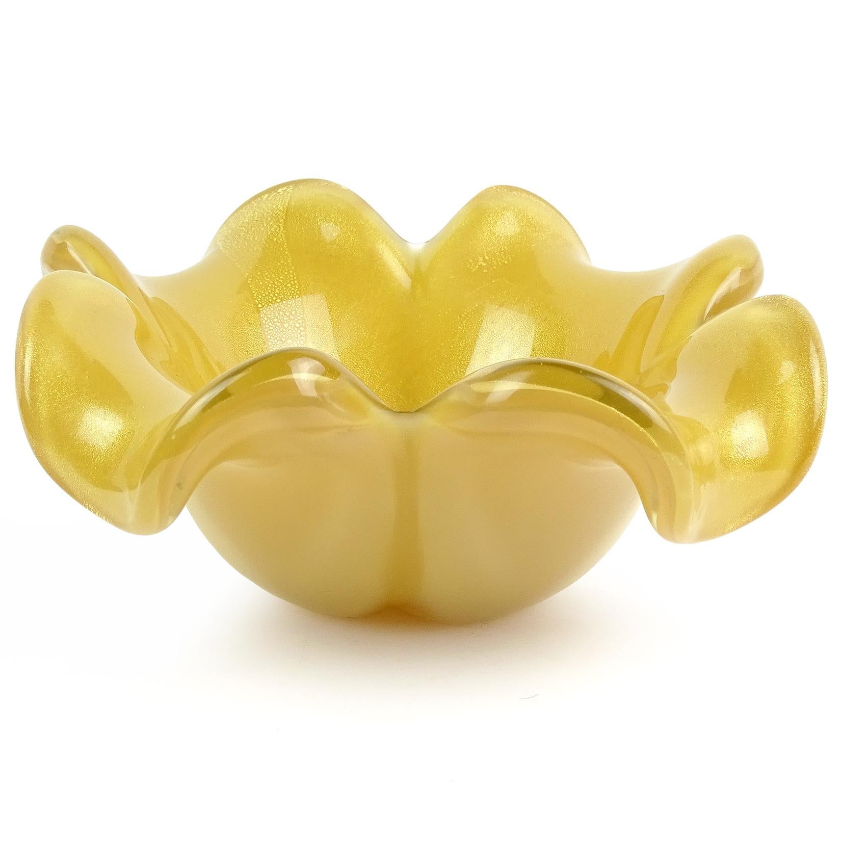 Priced Per Item (2 bowls available). Beautiful vintage Murano hand blown opalescent honey yellow and gold flecks Italian art glass flower shaped bowl. Attributed to designer Alfredo Barbini. The piece has a beautiful shape, with open petals, and