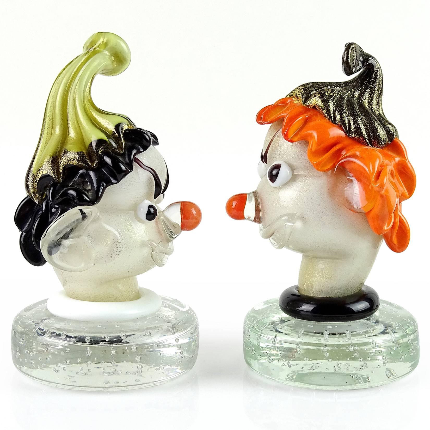 Priced per item (2 different designs available) - Beautiful and cute vintage Murano hand blown orange, black, white and gold flecks Italian art glass elf head paperweights. Documented to designer Alfredo Barbini. Very expressive little guys, with